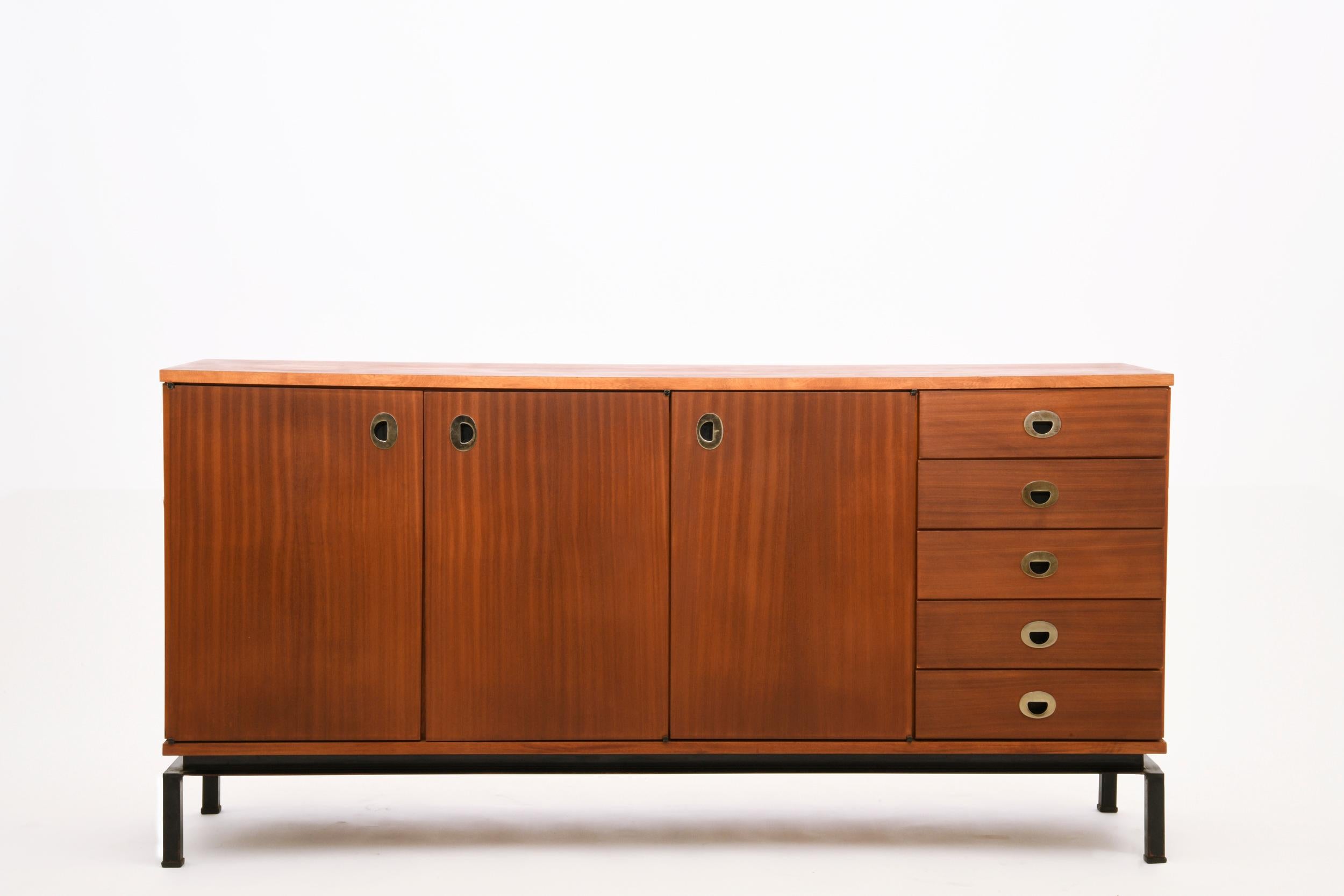 This sideboard (Edition Alveole) is made of teak and made by Marcel Gascoin, circa 1950.