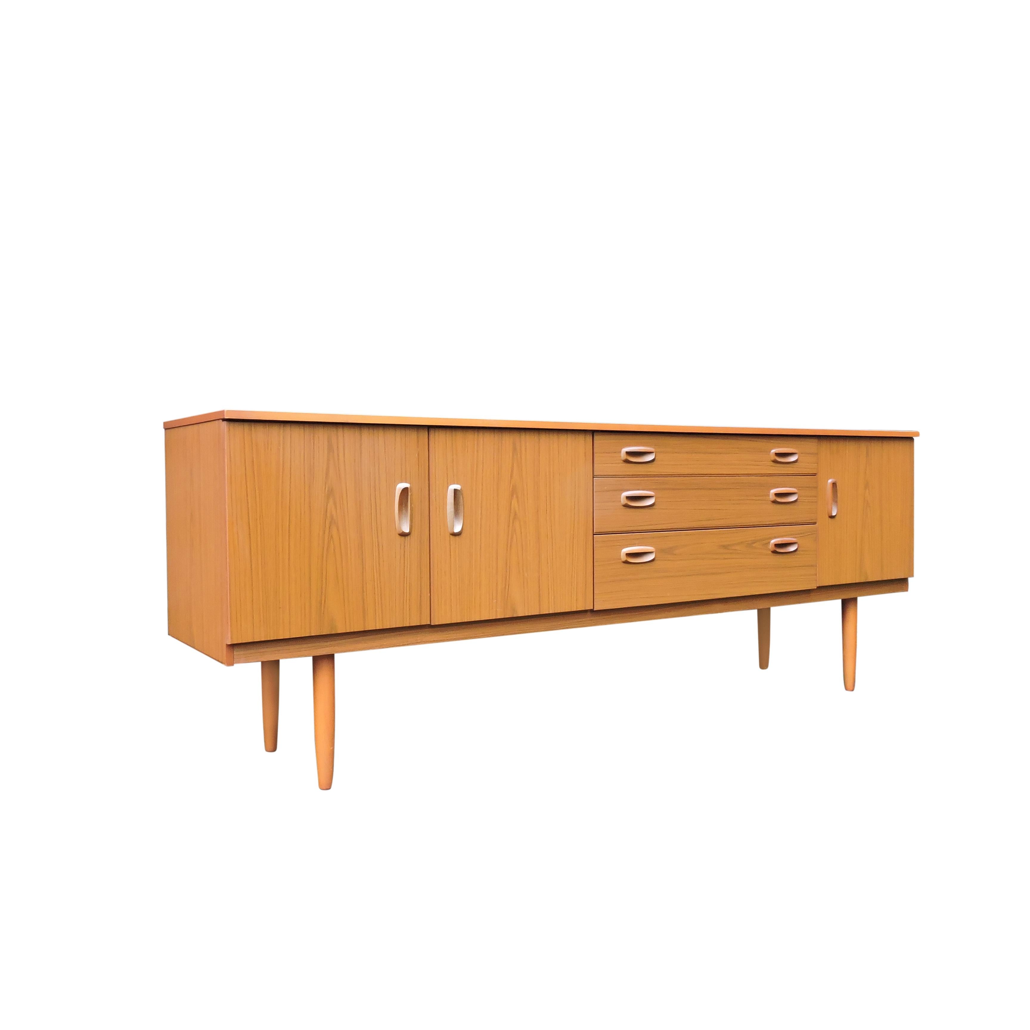 A long teak sideboard produced by Schreiber in the 1970s.