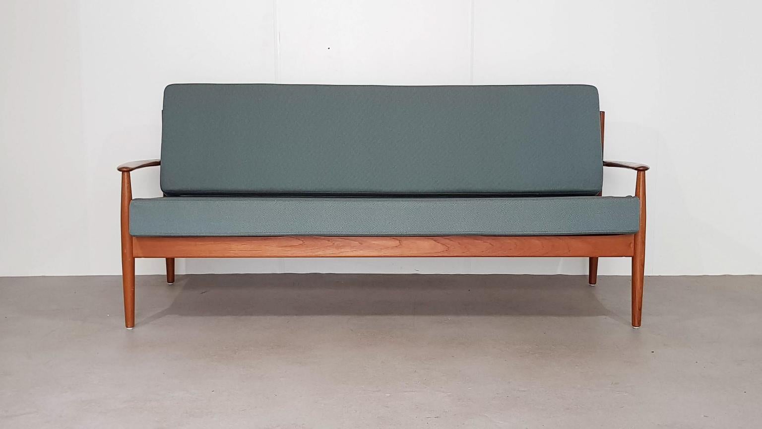 Teak sofa by Grete Jalk for France and Son, model 118, Denmark, 1950s

In good condition with new light green upholstery.

Measures: Length 190 cm; seating 170 cm

Depth 80 cm; seating 50 cm

Height 84 cm; seating 45 cm.
