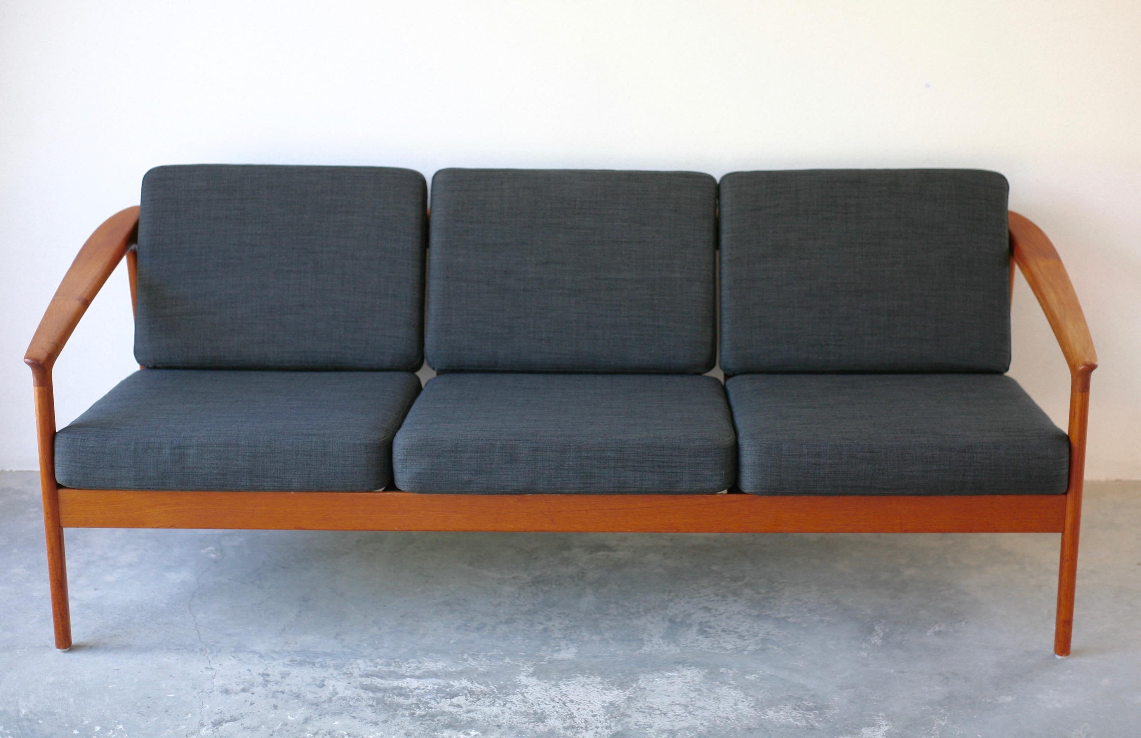 Teak sofa from the series Monterey designed by Folke Ohlsson in the early 1960s. This item manufactured in 1963 by Bodafors in Sweden. Newly upholstered cushions and new Fagas rubber bands throughout. Excellent condition with an exceptional design