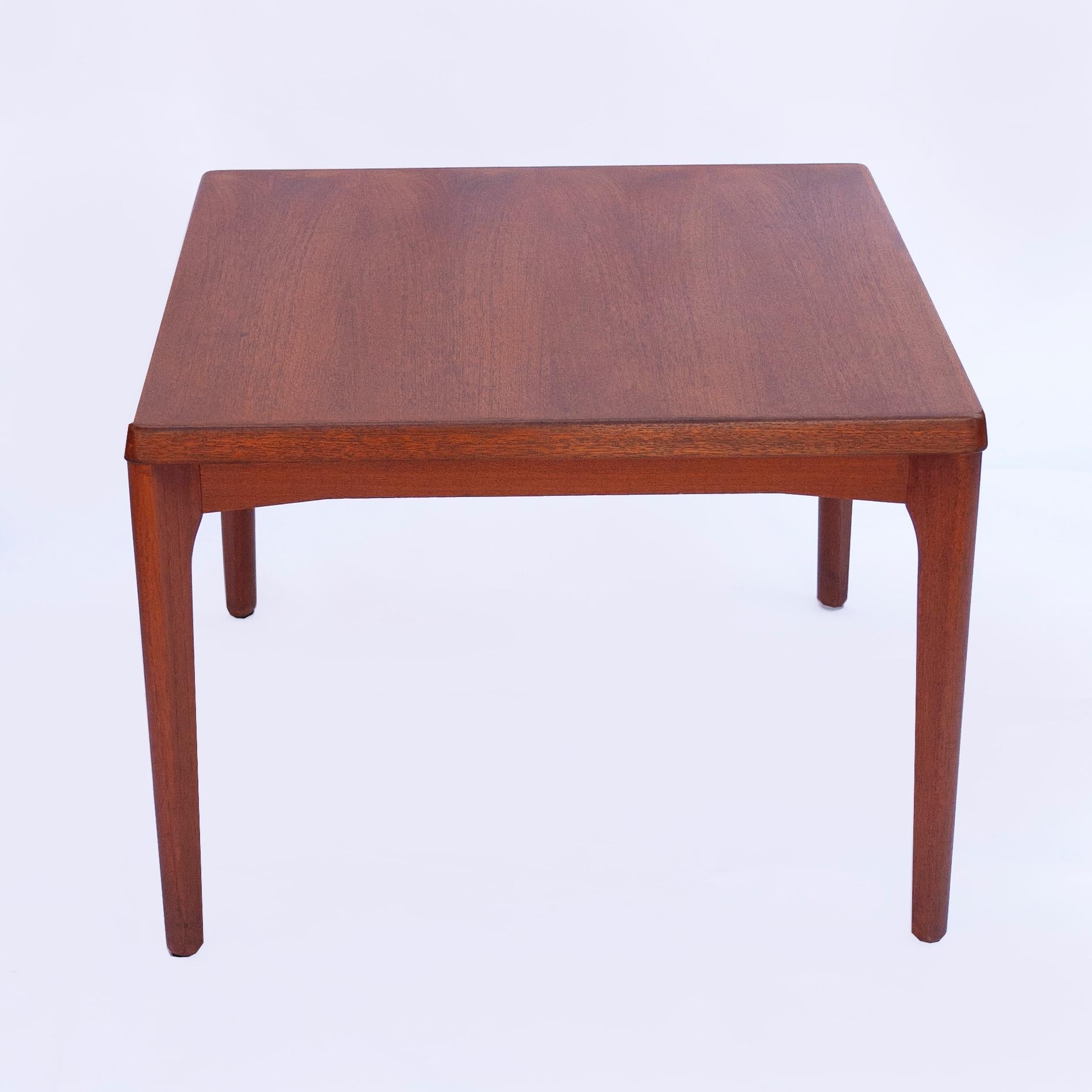 A square teak coffee table from the 1960s.

Designer - Henning Kjærnulf

Manufacturer -Vejle Stole & Møbelfabrik

Design Period - 1960 to 1969

Country of Manufacture - Denmark

Attribution Marks - Under Table

Detailed Condition - Good