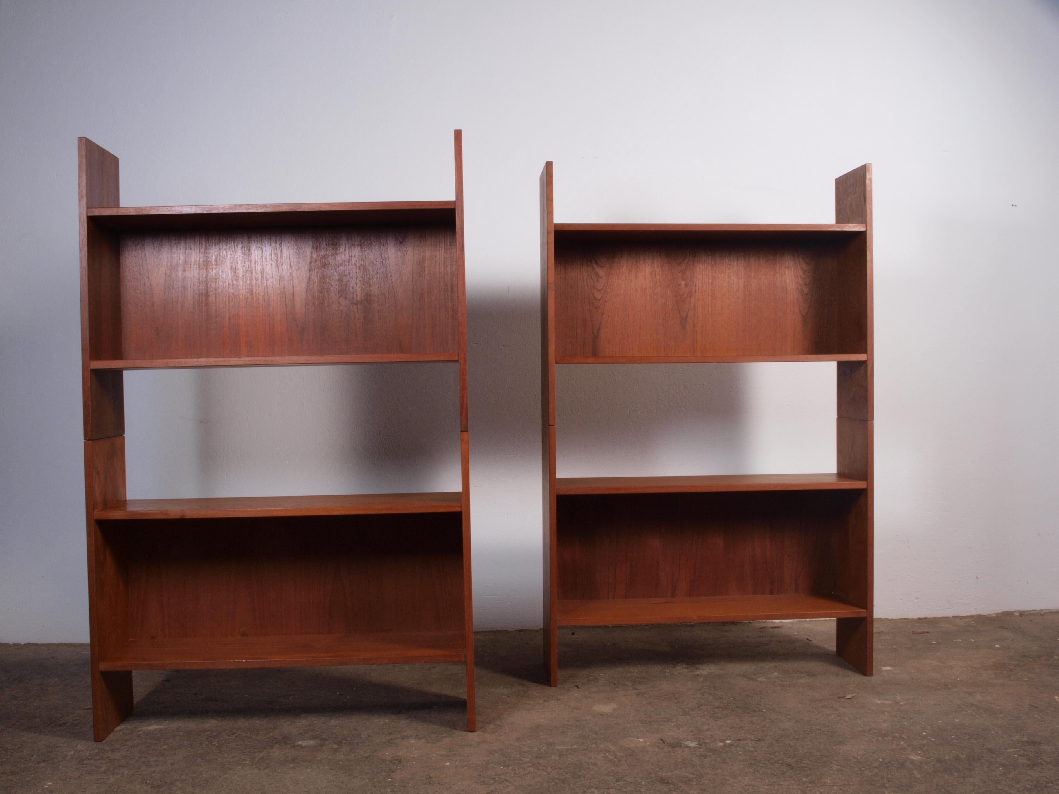 Produced in Denmark during the 1960s, this set comprises four individual bookcases crafted from teak veneer. Following a surface refresh, they serve well as bedside cabinets for convenient small item storage or as a standalone shelf system.

The