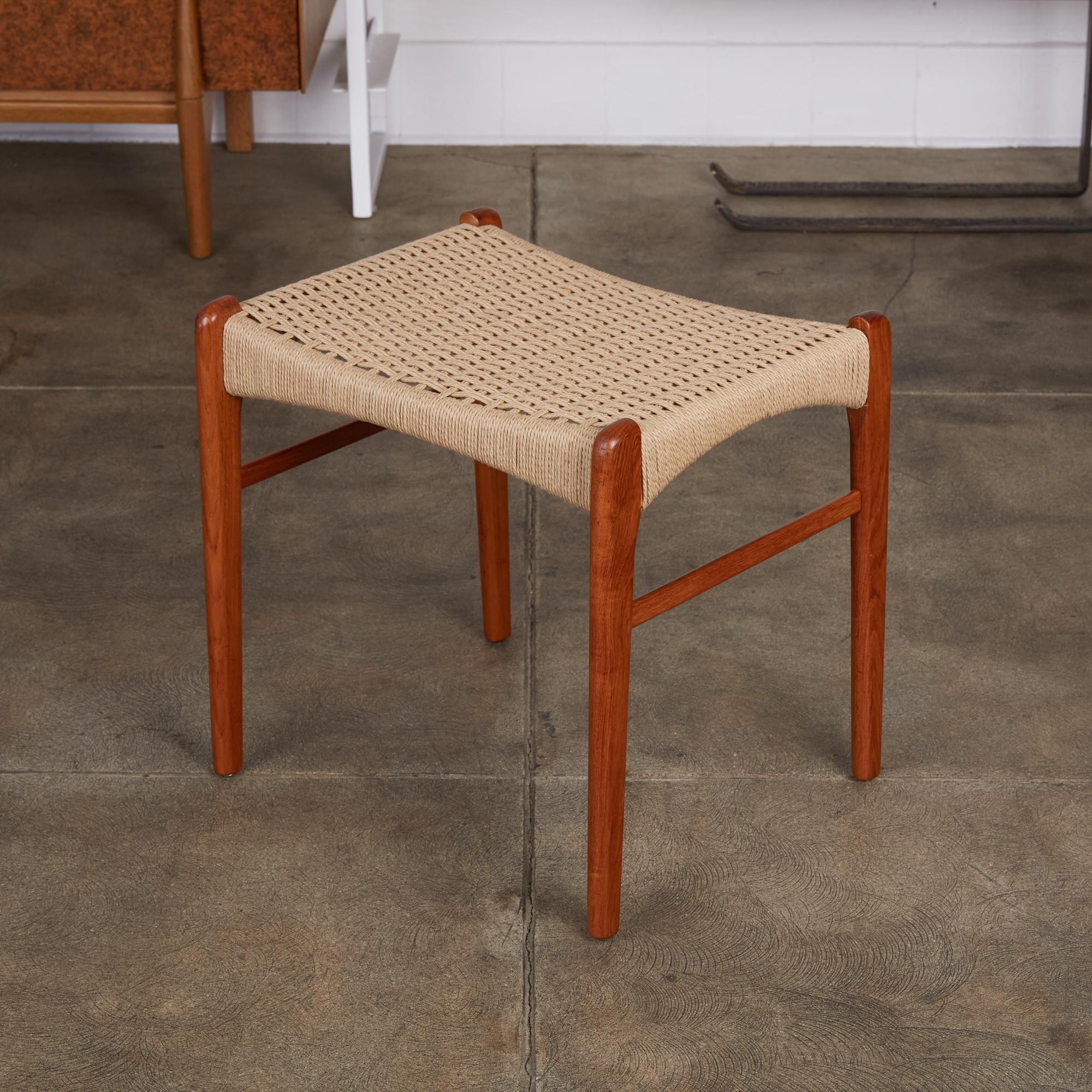 Teak stool by Peder Kristensen for Glyngøre Stolefabrick, Denmark, circa 1950s. This stool or ottoman features an oiled teak frame with teak stretchers, and a newly woven Danish cord seat according to original design. This Minimalist stool is