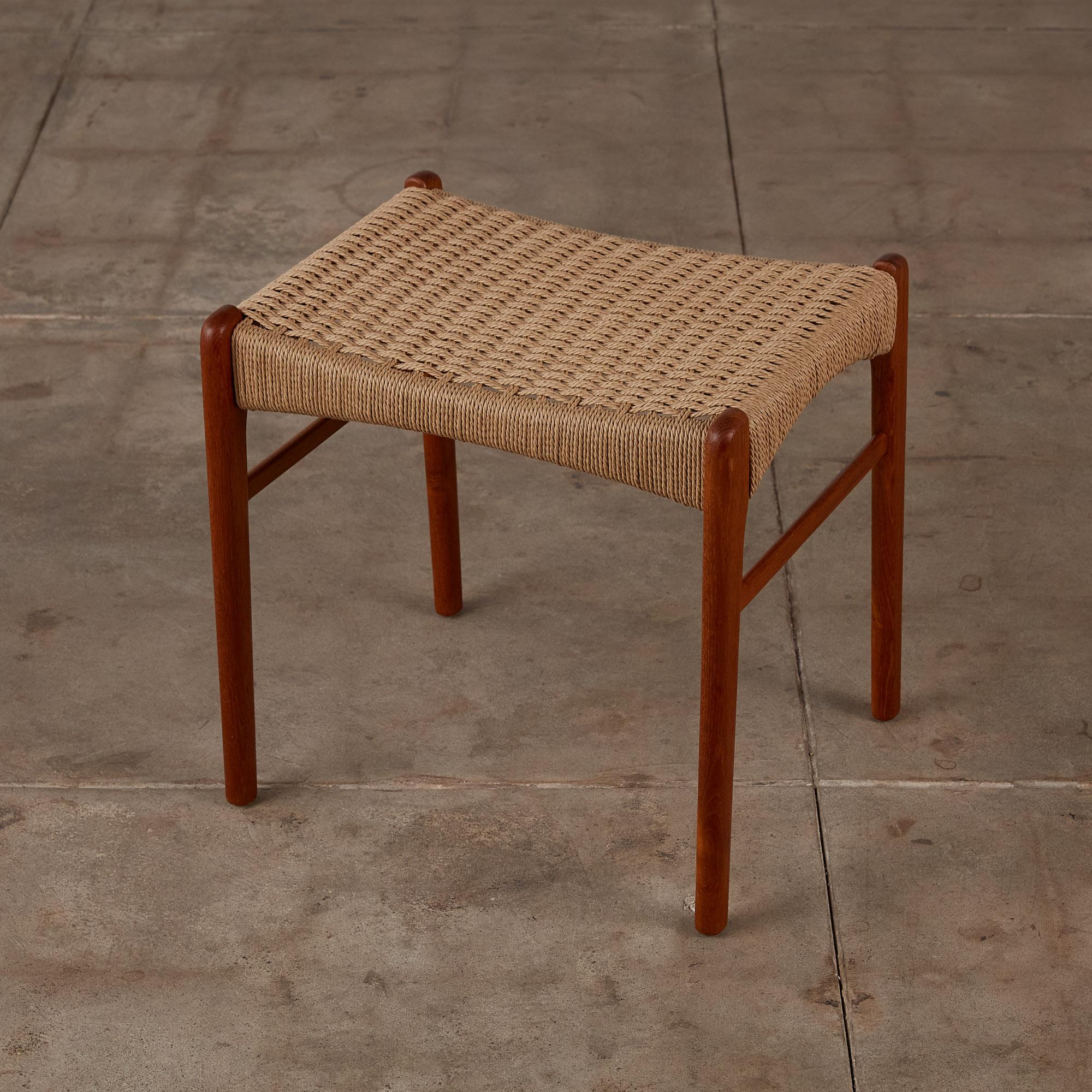 Teak stool by Peder Kristensen for Glyngøre Stolefabrick, Denmark c.1950s. This stool or ottoman features an oiled teak frame with teak stretchers, and a newly woven Danish cord seat according to original design. This Minimalist stool is perfect for