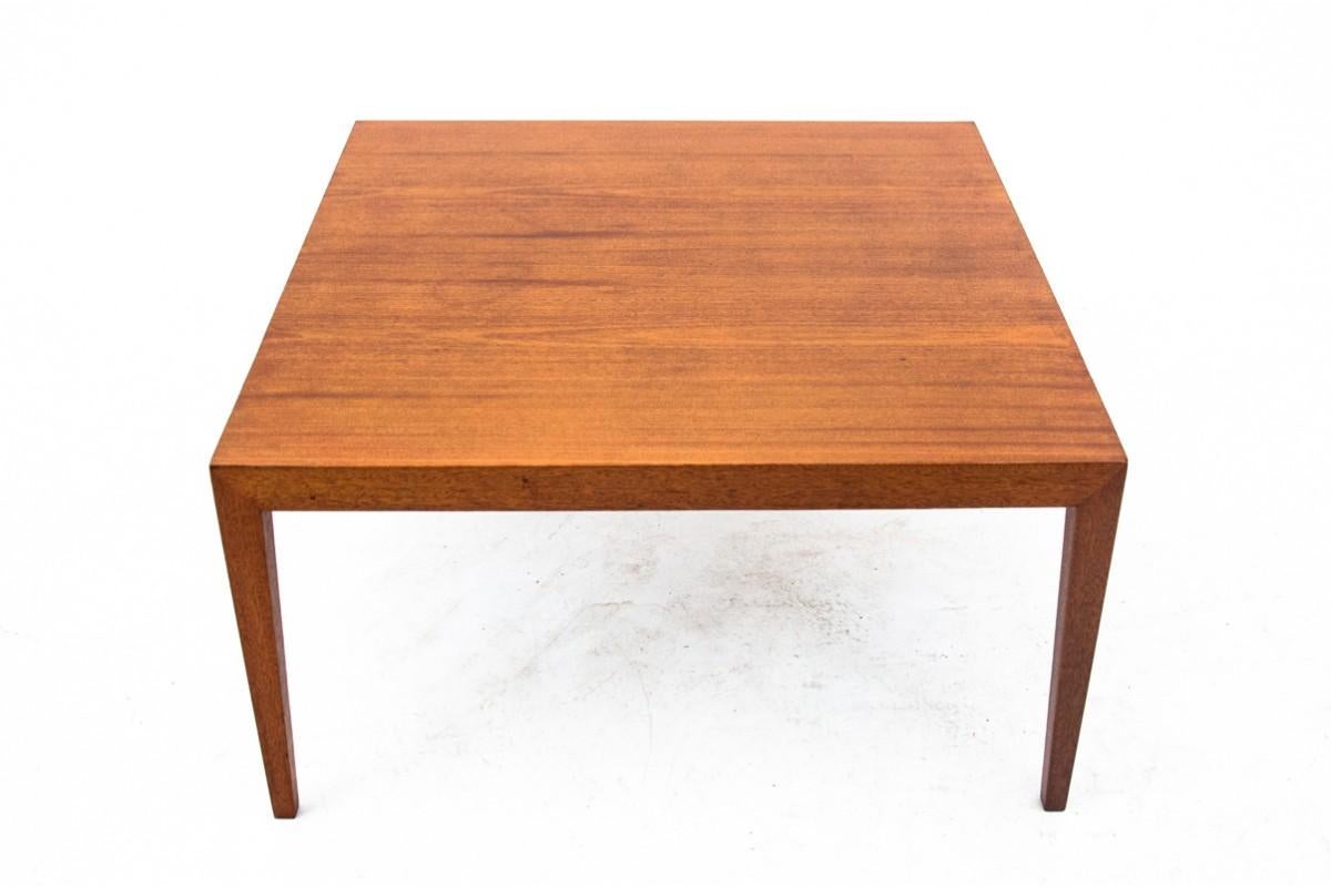 A table from the 1960s imported from Denmark. Made of teak wood. Its simple form will work perfectly in modern minimalist interiors. 

The furniture is in very good condition, after professional renovation. The wood has been cleaned and finished