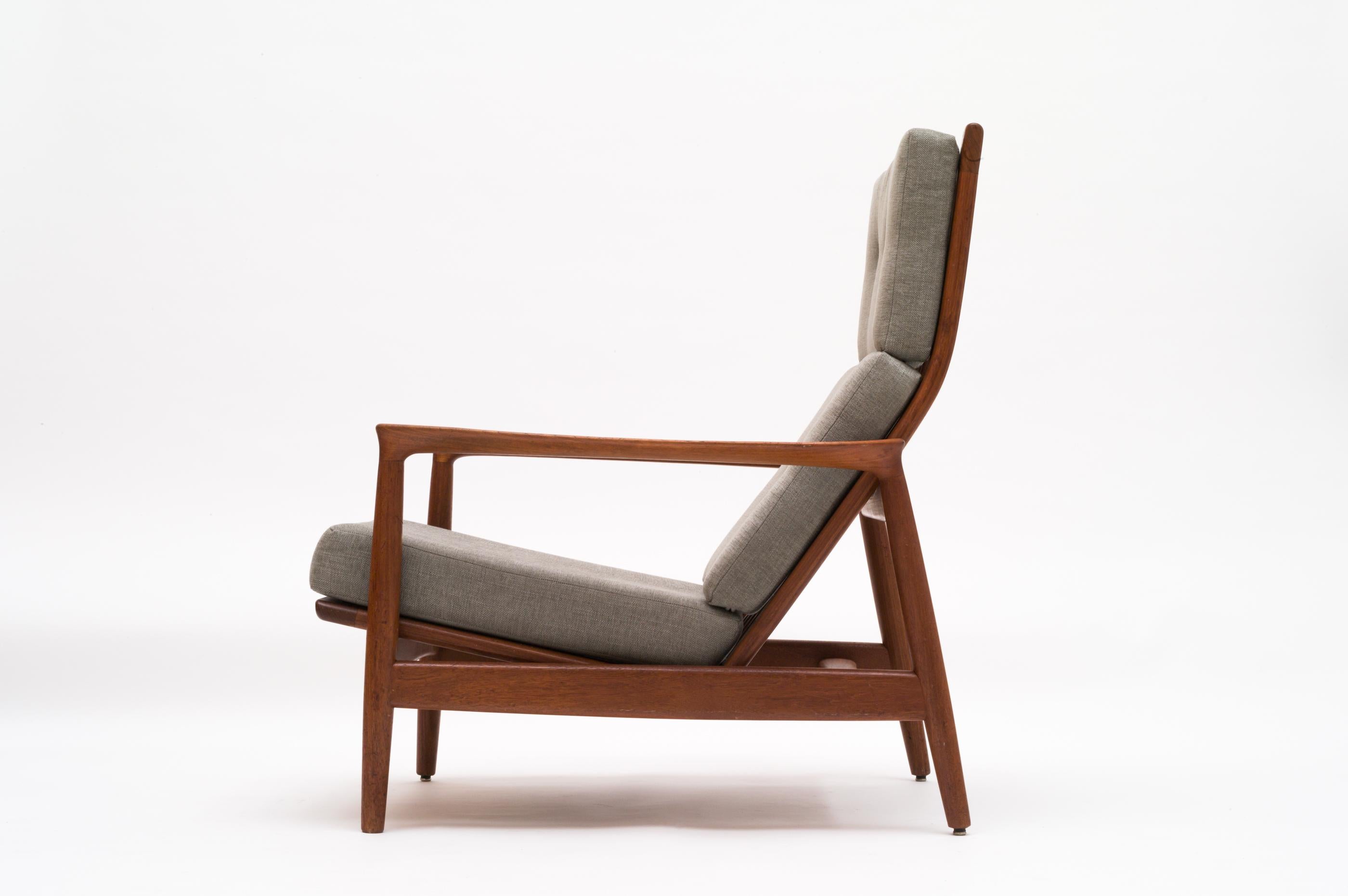 Tall back armchair designed by Folke Ohlsson for DUX in the 1960s. Model 