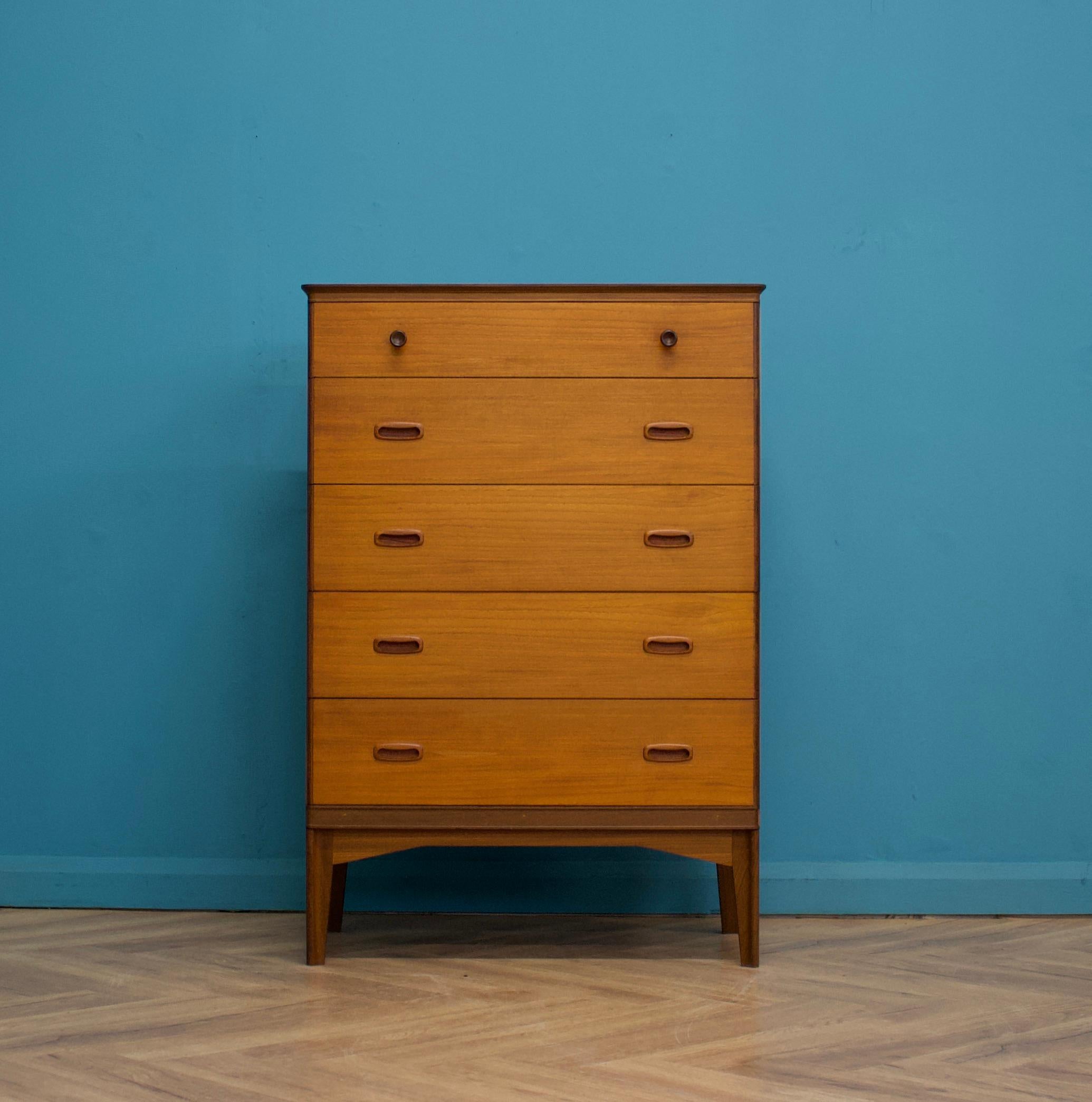 A teak chest of drawers from Austinsuite
Featuring 5 drawers