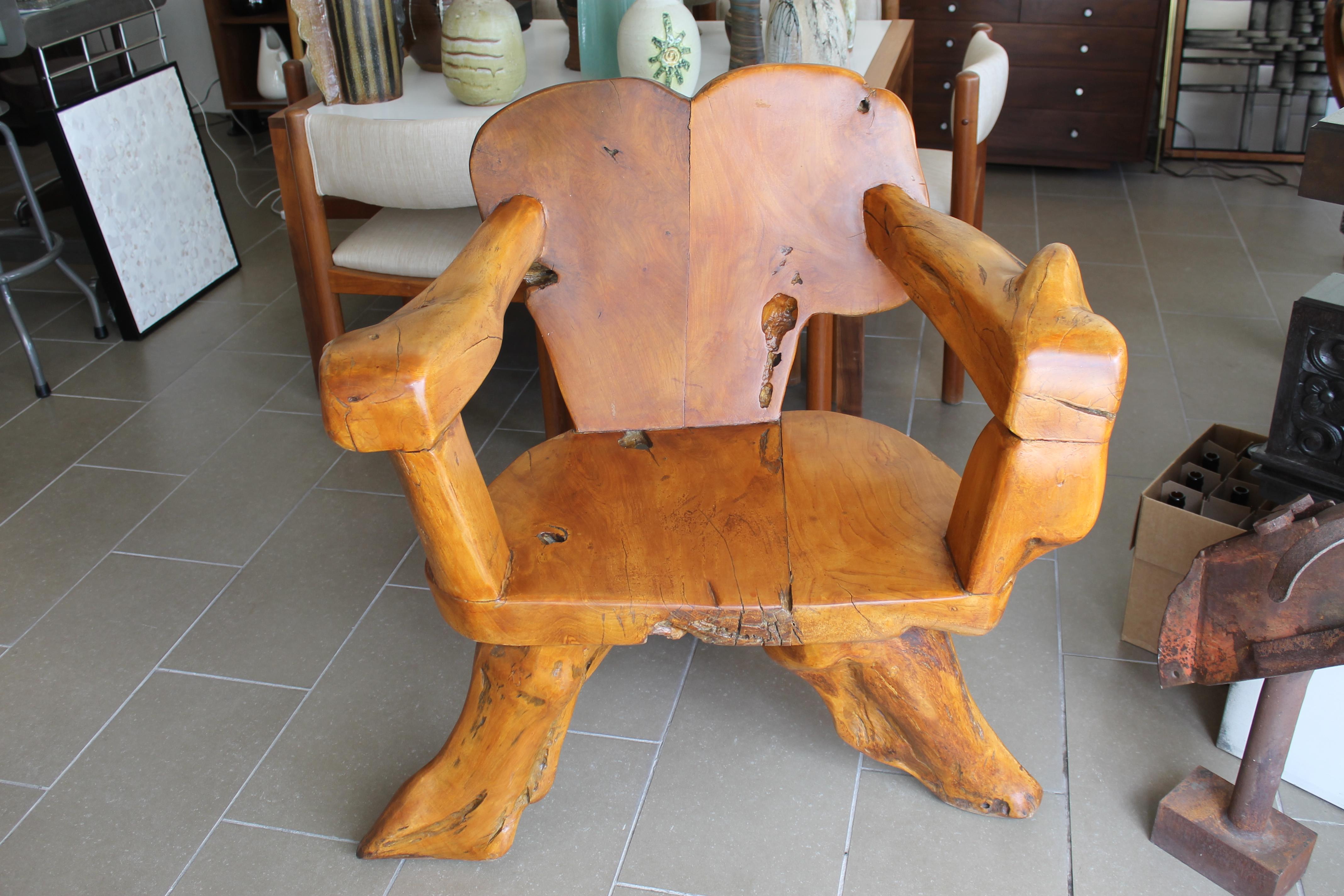 Custom teak tree root hand crafted club chair. This chair is more like a throne. Chair measures 37