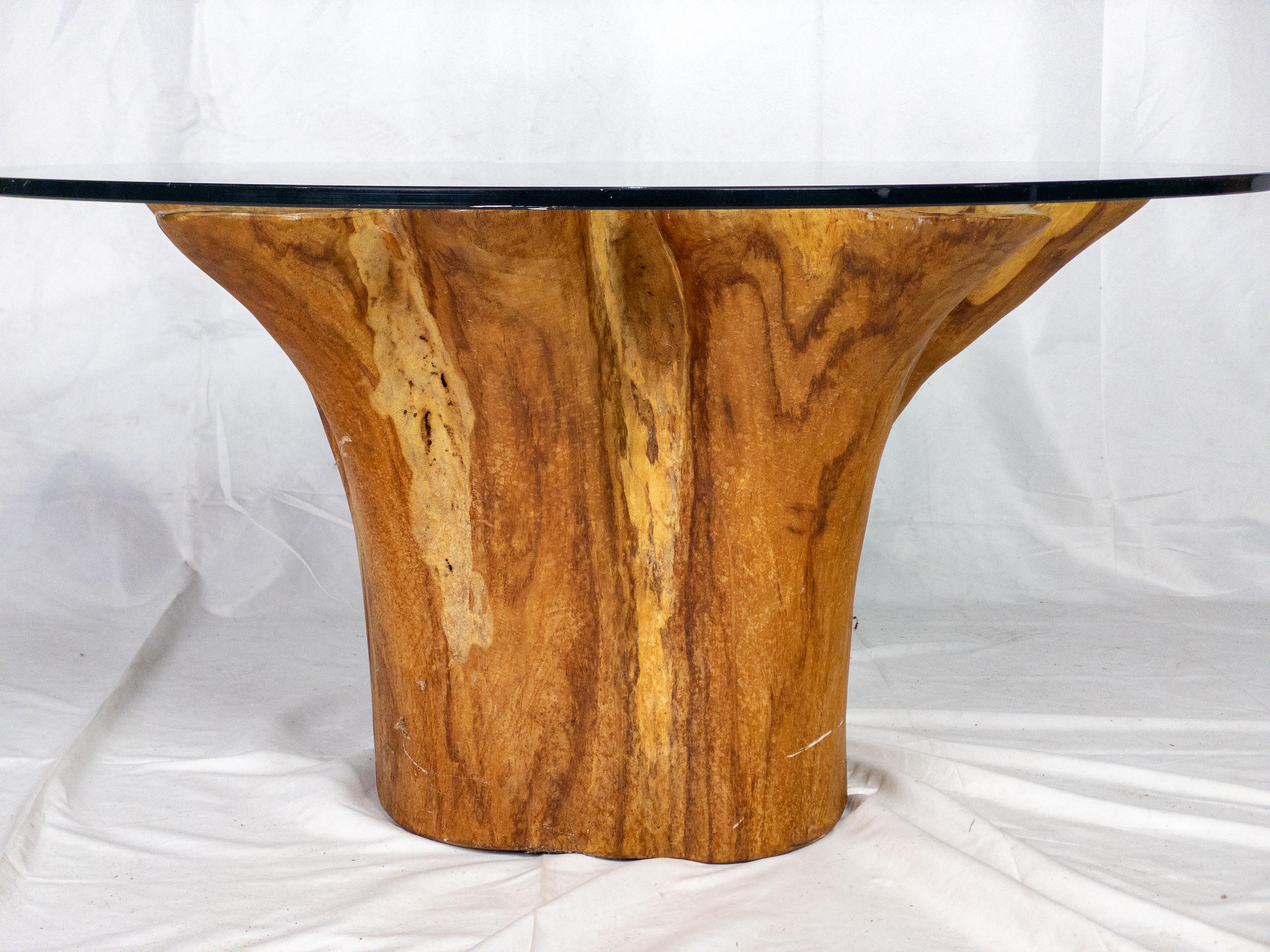 tree trunk coffee table with glass