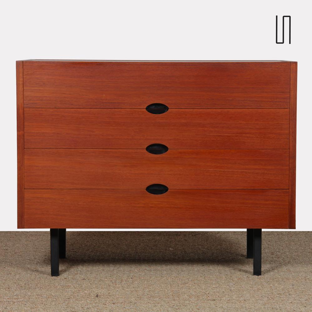 This teak dressing table was designed by Joseph-André Motte for the publisher Charron. It dates from the 1960s. This storage unit opens with a series of three drawers and includes an integrated mirror at the top. It is in good vintage condition.