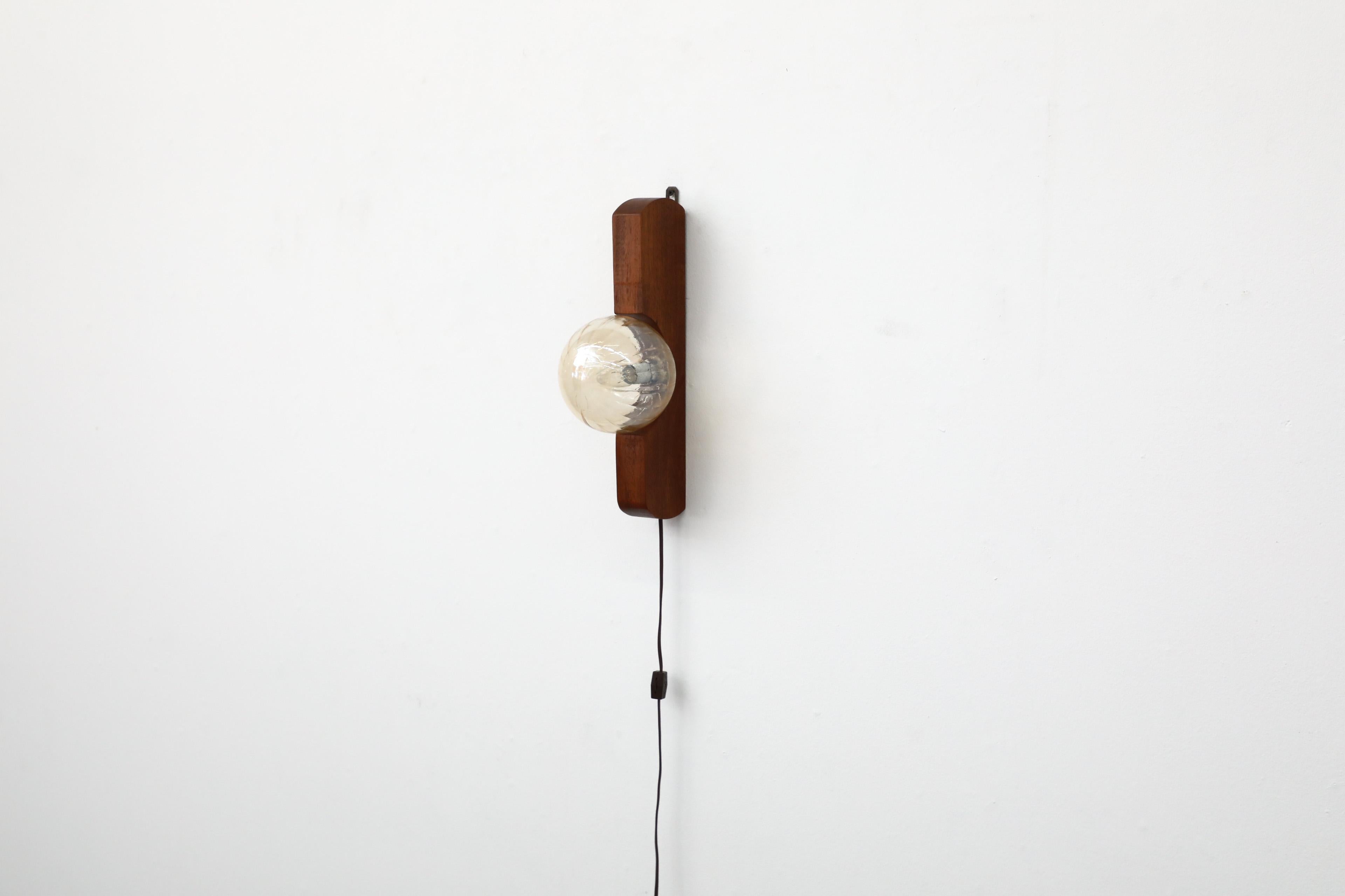 German Teak Wall Mount Light Sconce with Amber Glass Globe Shade by Temde