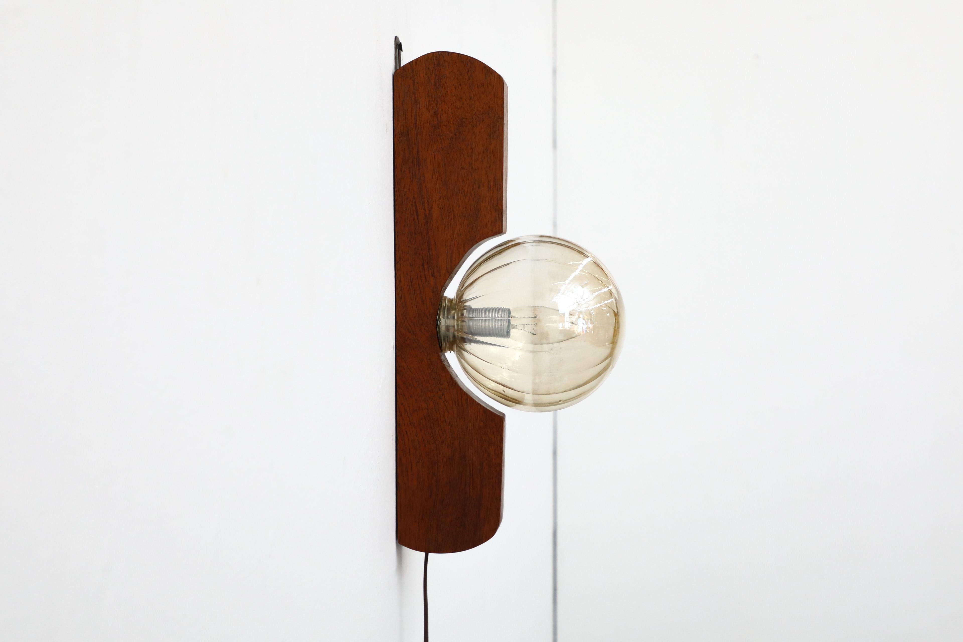 Teak Wall Mount Light Sconce with Amber Glass Globe Shade by Temde In Good Condition In Los Angeles, CA