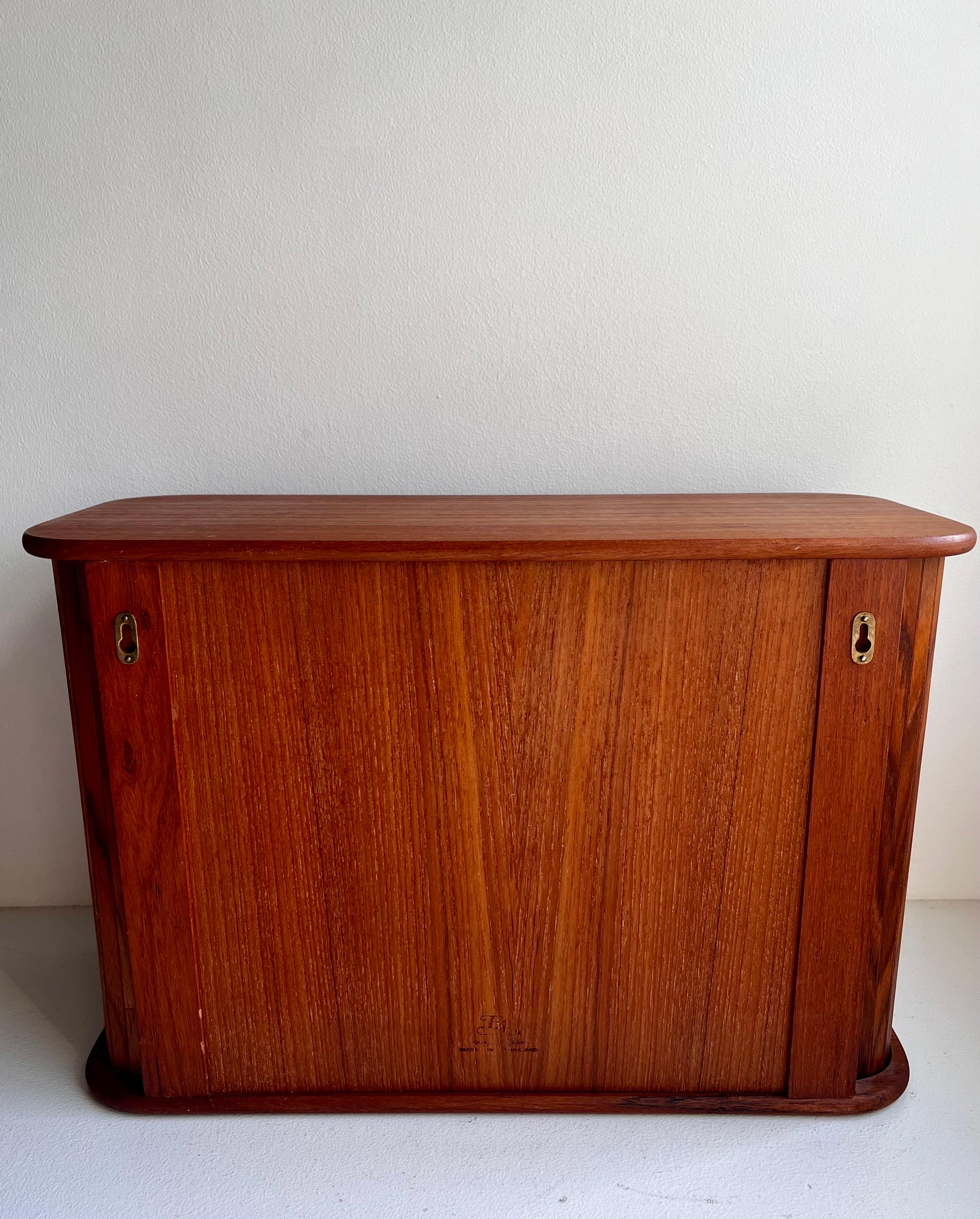 Teak Wall Mounted Storage Cabinet with Tambour Doors For Sale 9