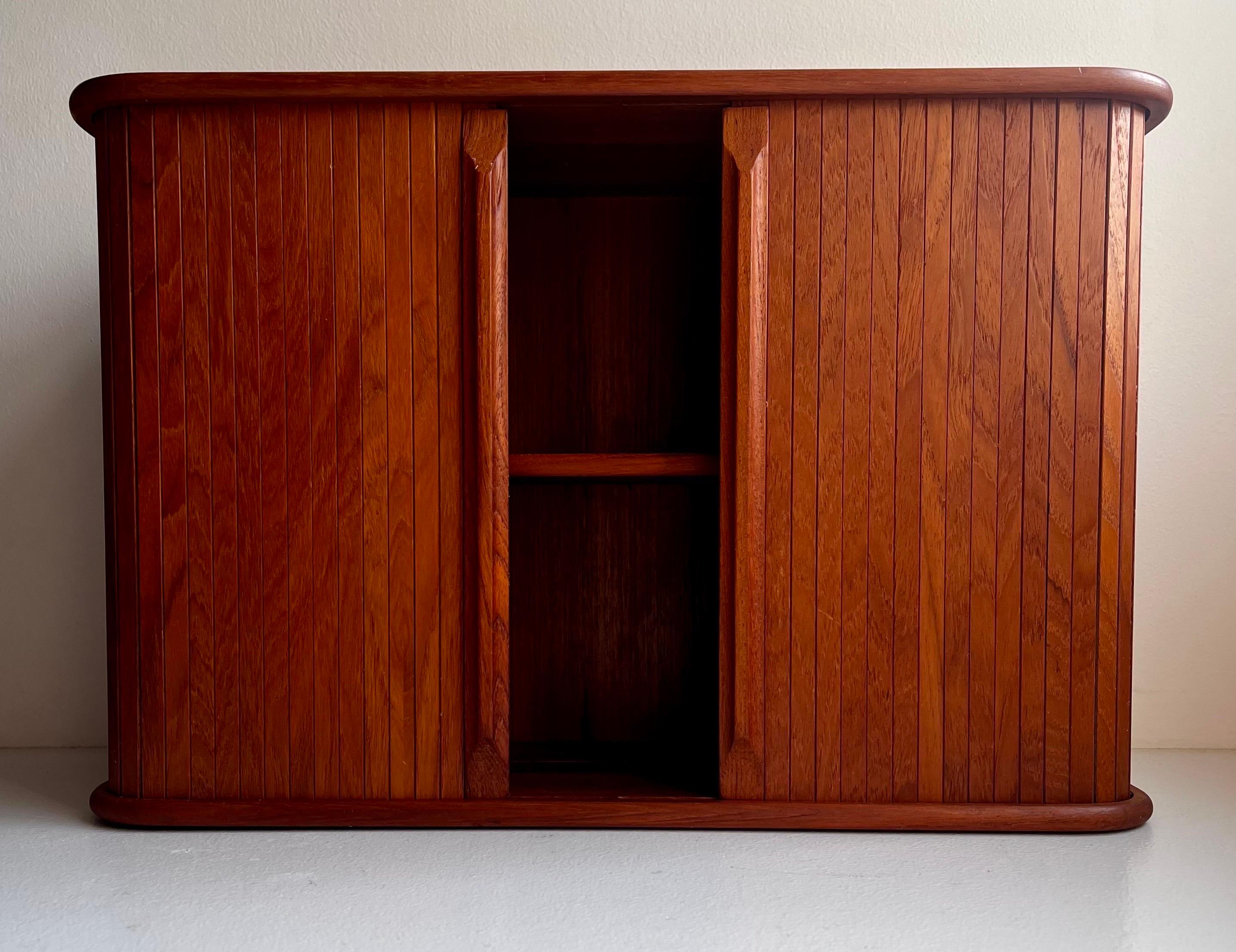 Scandinavian Modern Teak Wall Mounted Storage Cabinet with Tambour Doors For Sale