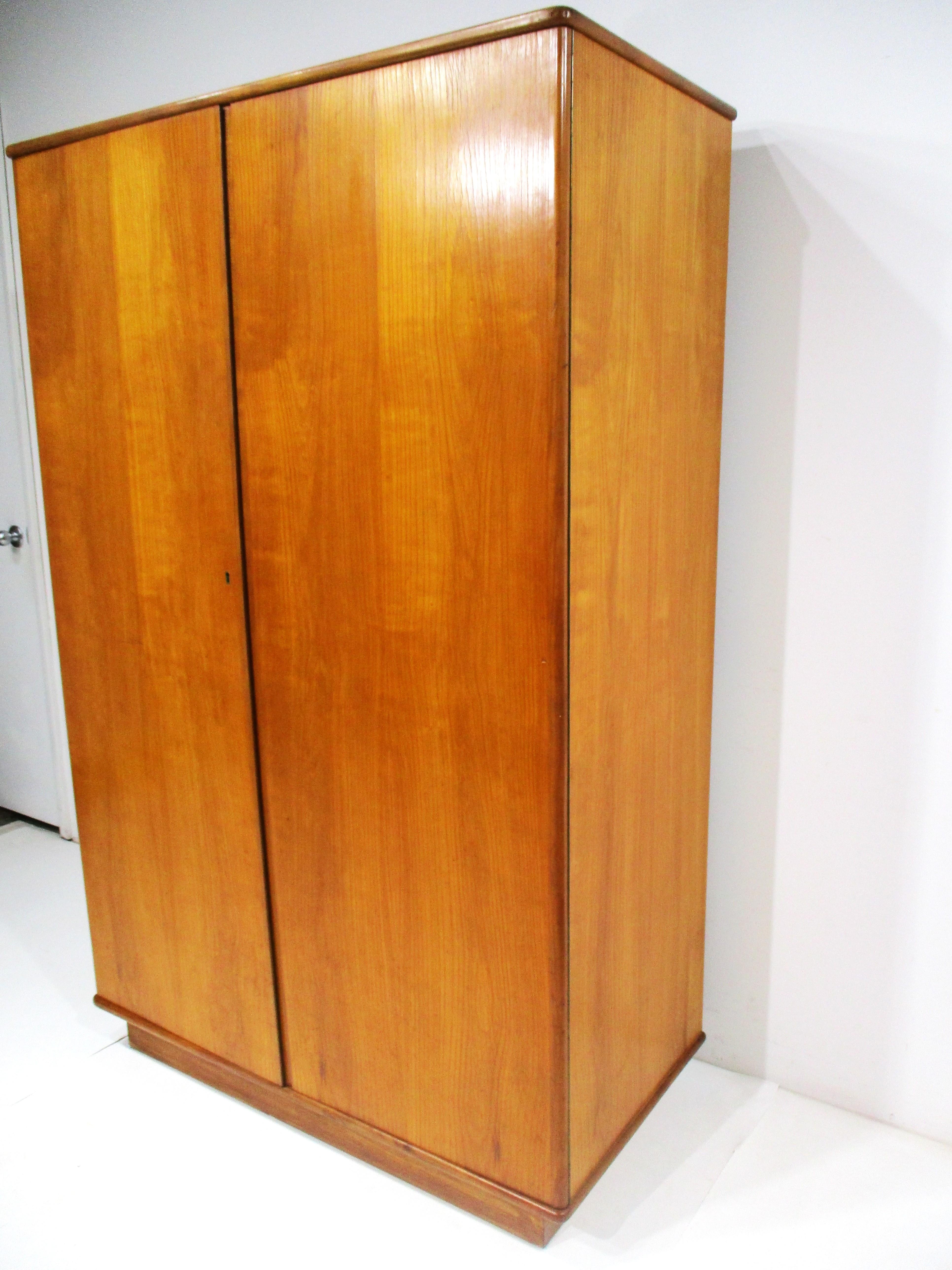 Mid-Century Modern Teak Wardrobe or Armoire in the style of Arne Vodder Denmark