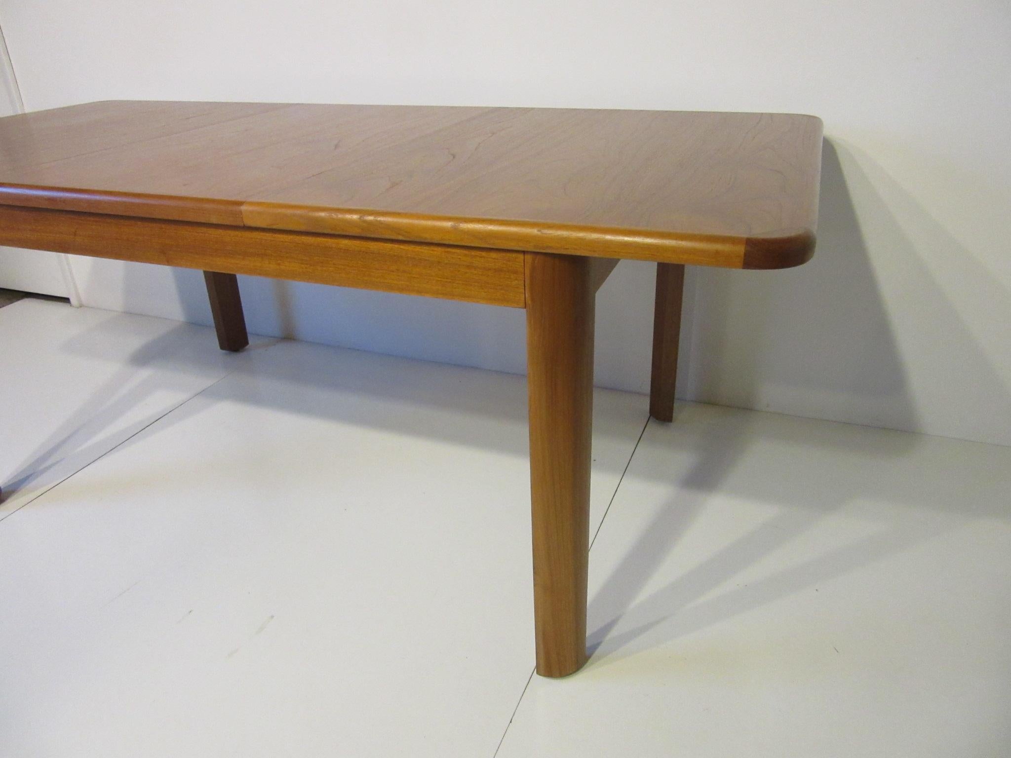 Mid-Century Modern Teak Wood Dining Table by the Nordic Furniture Company