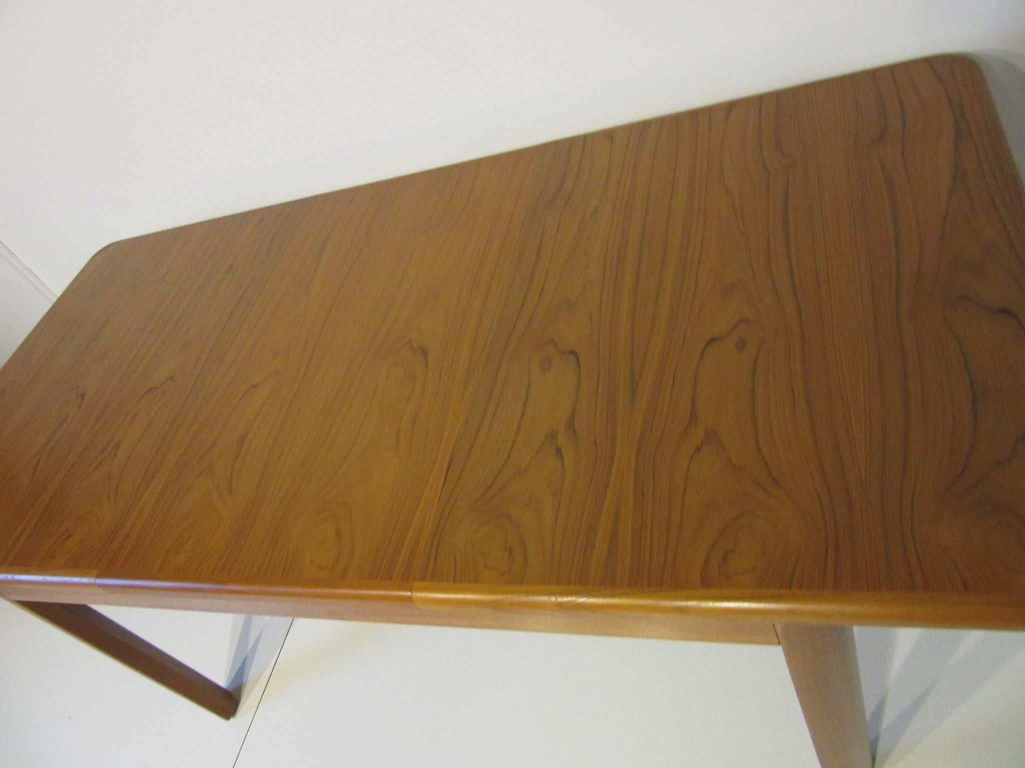 Teak Wood Dining Table by the Nordic Furniture Company In Good Condition In Cincinnati, OH