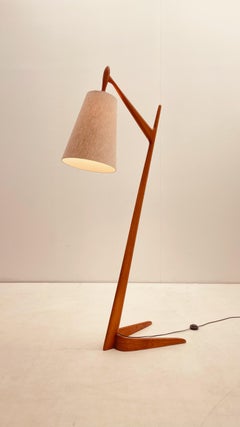 Teak wood floorlamp with Boomerang shape foot