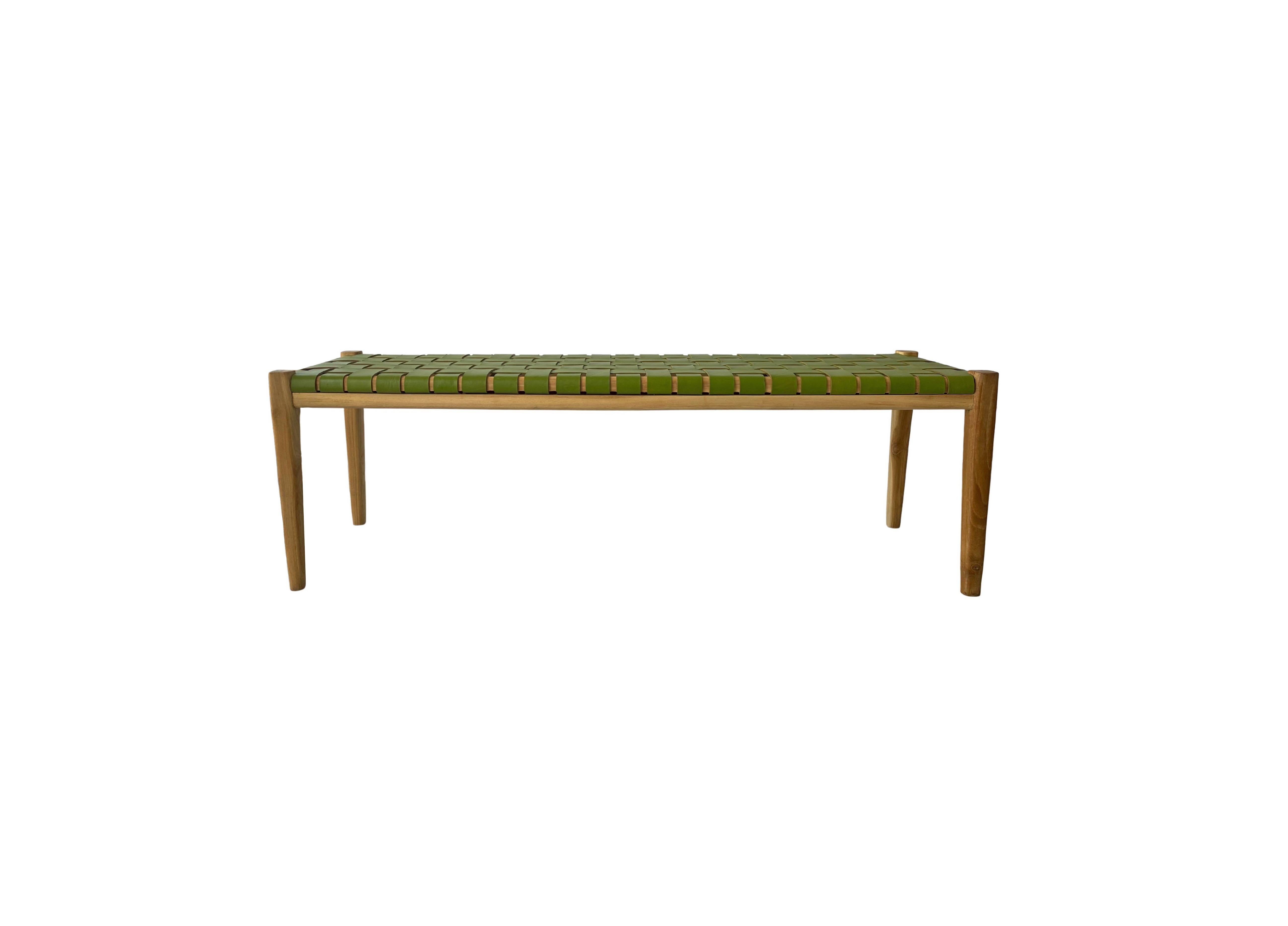 A hand-crafted teak framed & woven leather strap bench. These benches are crafted by local artisans using a wood joinery technique without the use of nails. They feature a subtle wood texture and are robust and sturdy.