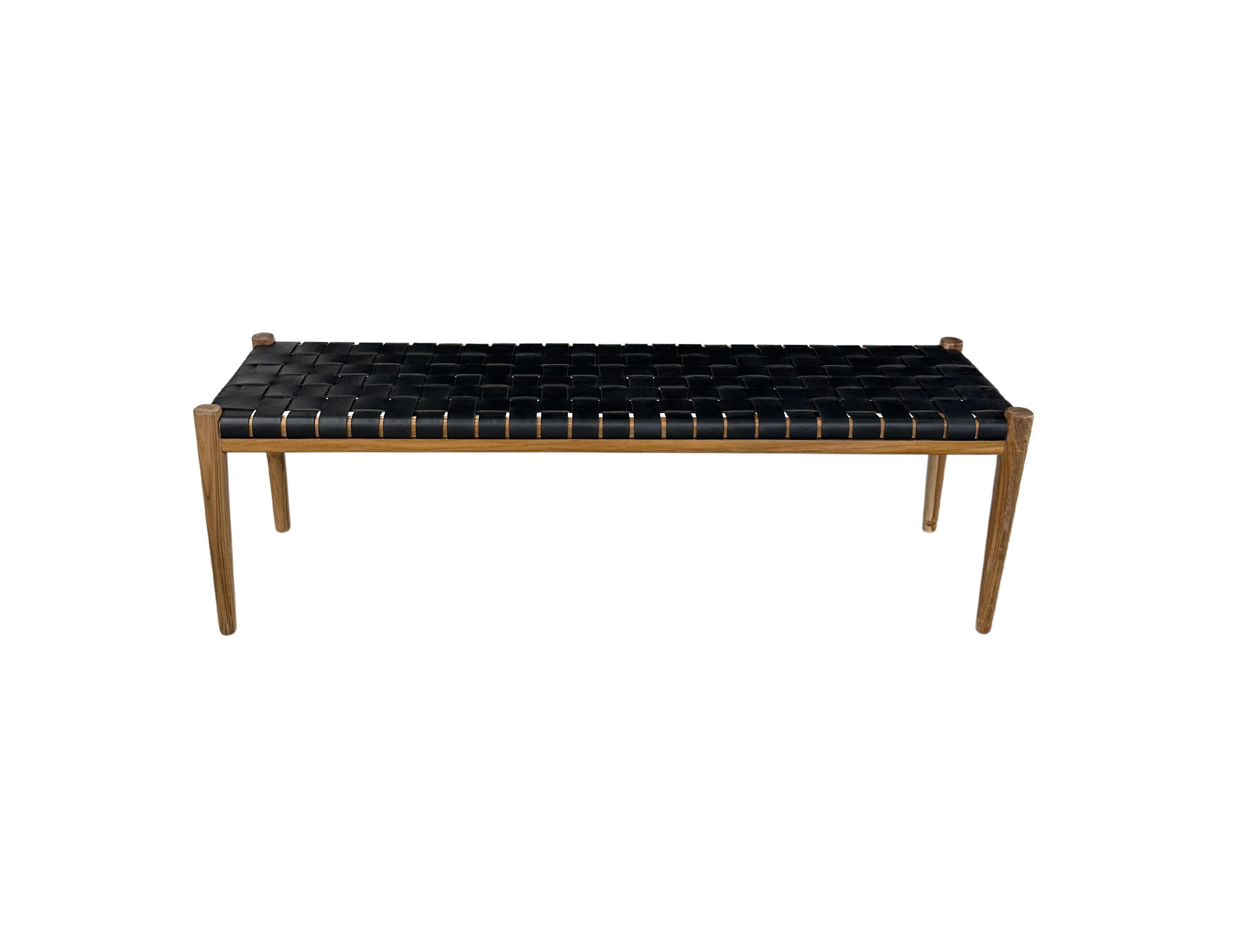 A hand-crafted teak framed & woven leather strap bench. These benches are crafted by local artisans using a wood joinery technique without the use of nails. They feature a subtle wood texture and are robust and sturdy.