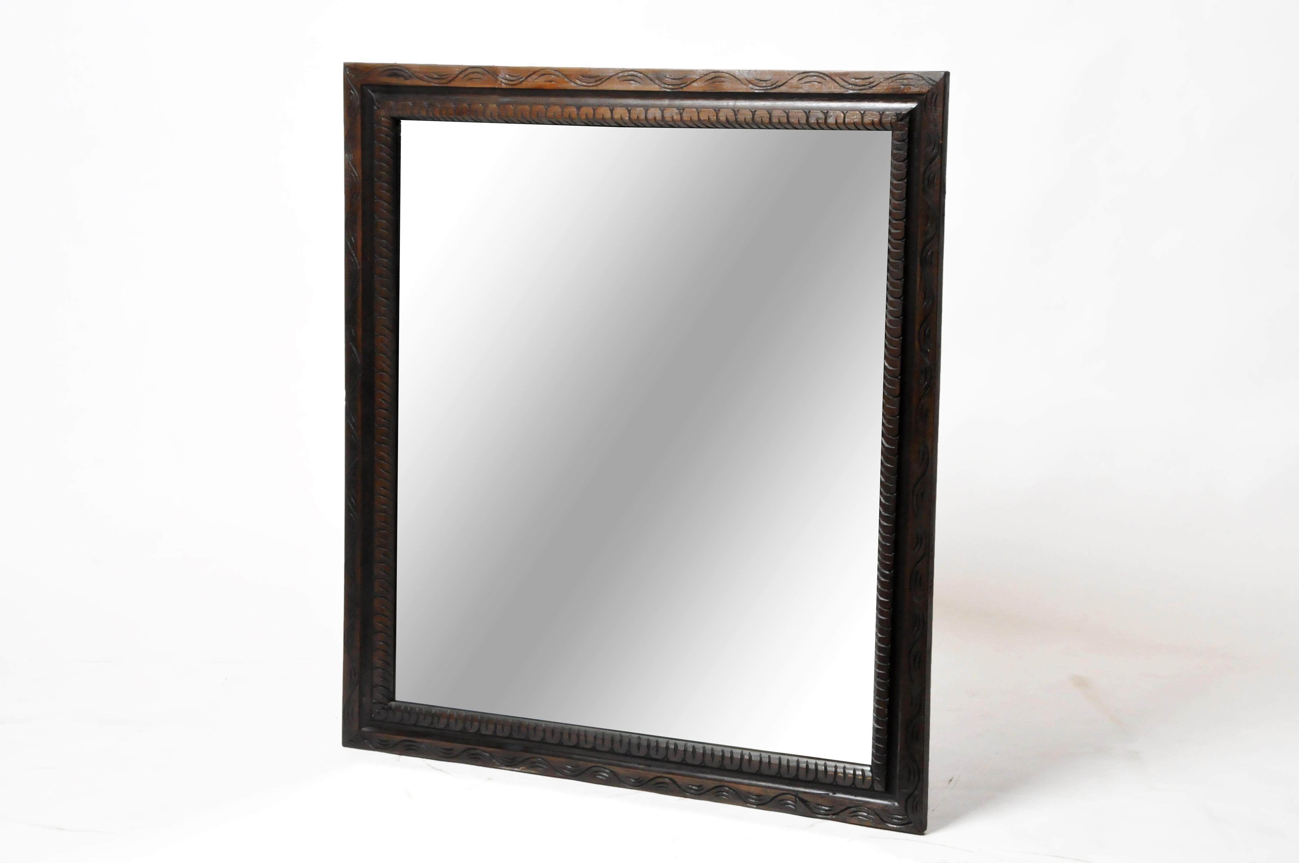 This mirror was hand-carved from teak wood. The frame is from a workshop in Chiang Mai, Thailand; it is new. Chiang Mai is the center of the wood carving industry in Thailand and is the source of many unique handicrafts.   For this mirror,