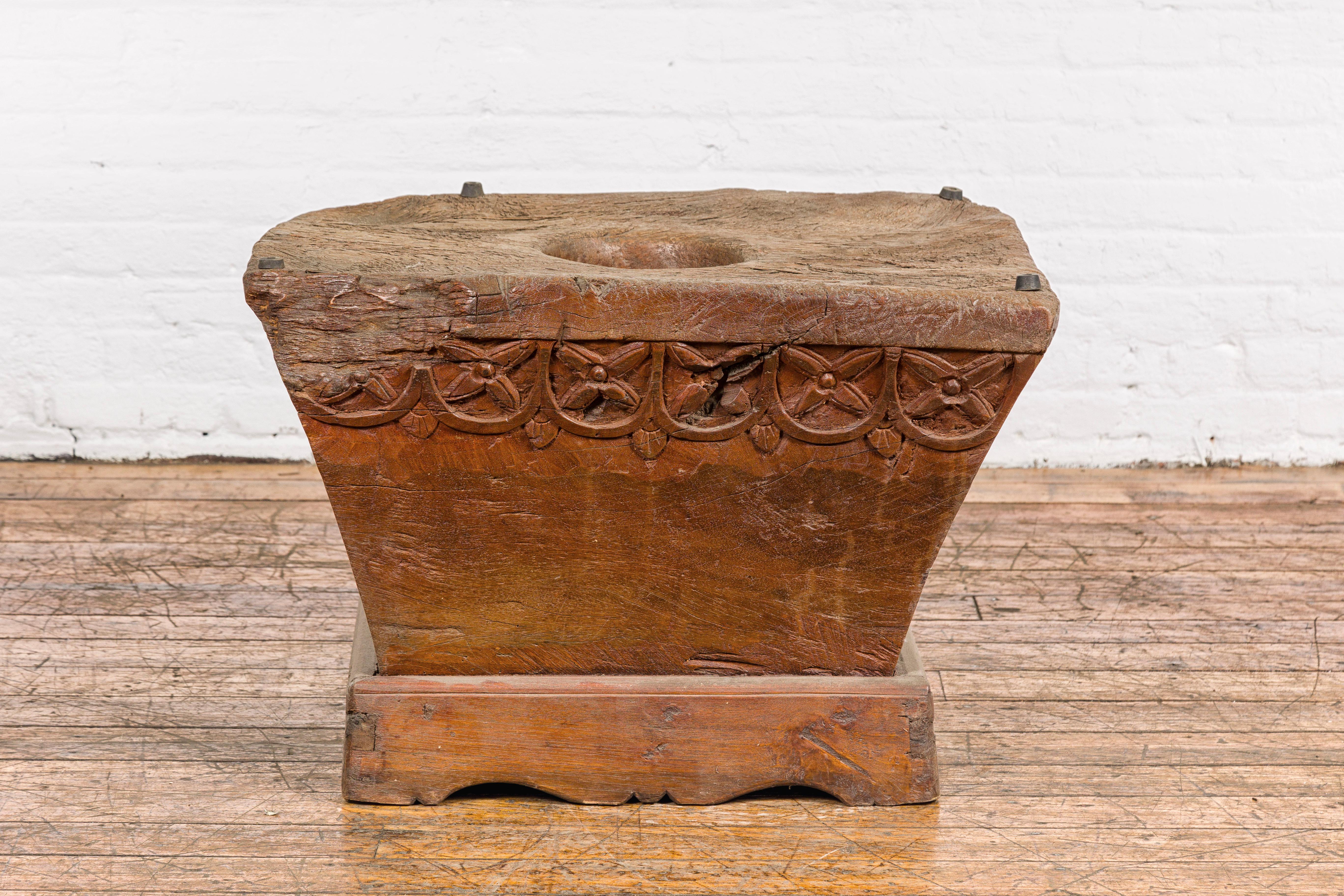 Indonesian Teak Wood Primitive Mortar Converted into Coffee Table with Carved Rosettes For Sale