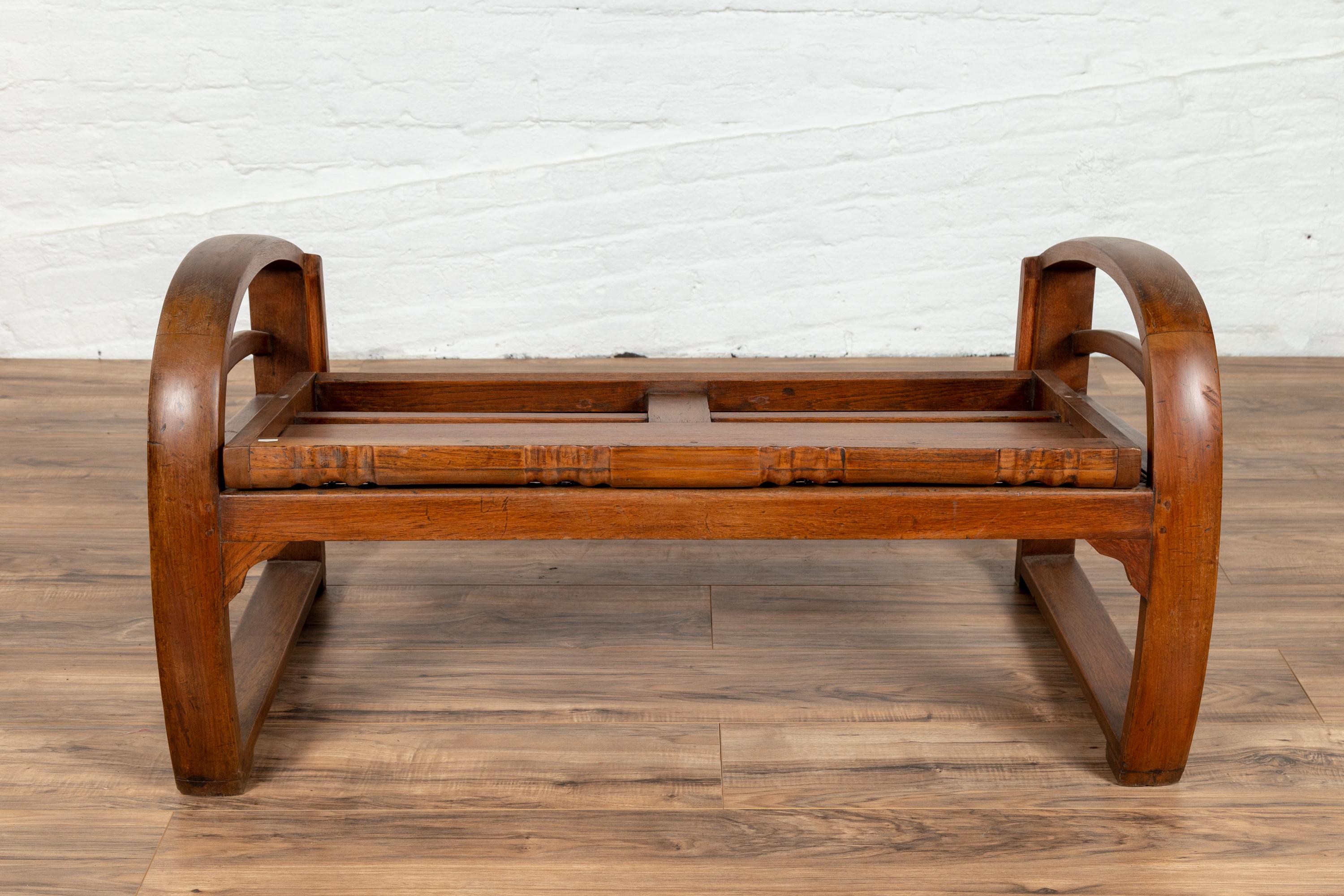 20th Century Teak Wood Settee from Madura with Folding Back, Looping Arms and Cane Seat For Sale