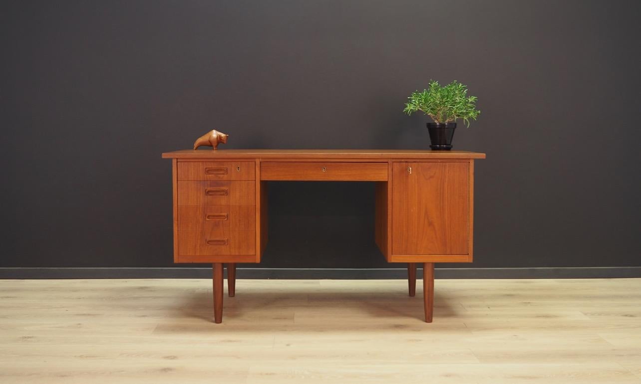Minimalist writing desk from the 1960s-1970s, classic form - Danish design. Finished with teak veneer, has five practical drawers and a spacious cabinet. The key in the set. Preserved in good condition (minor scratches and bruises) - directly for