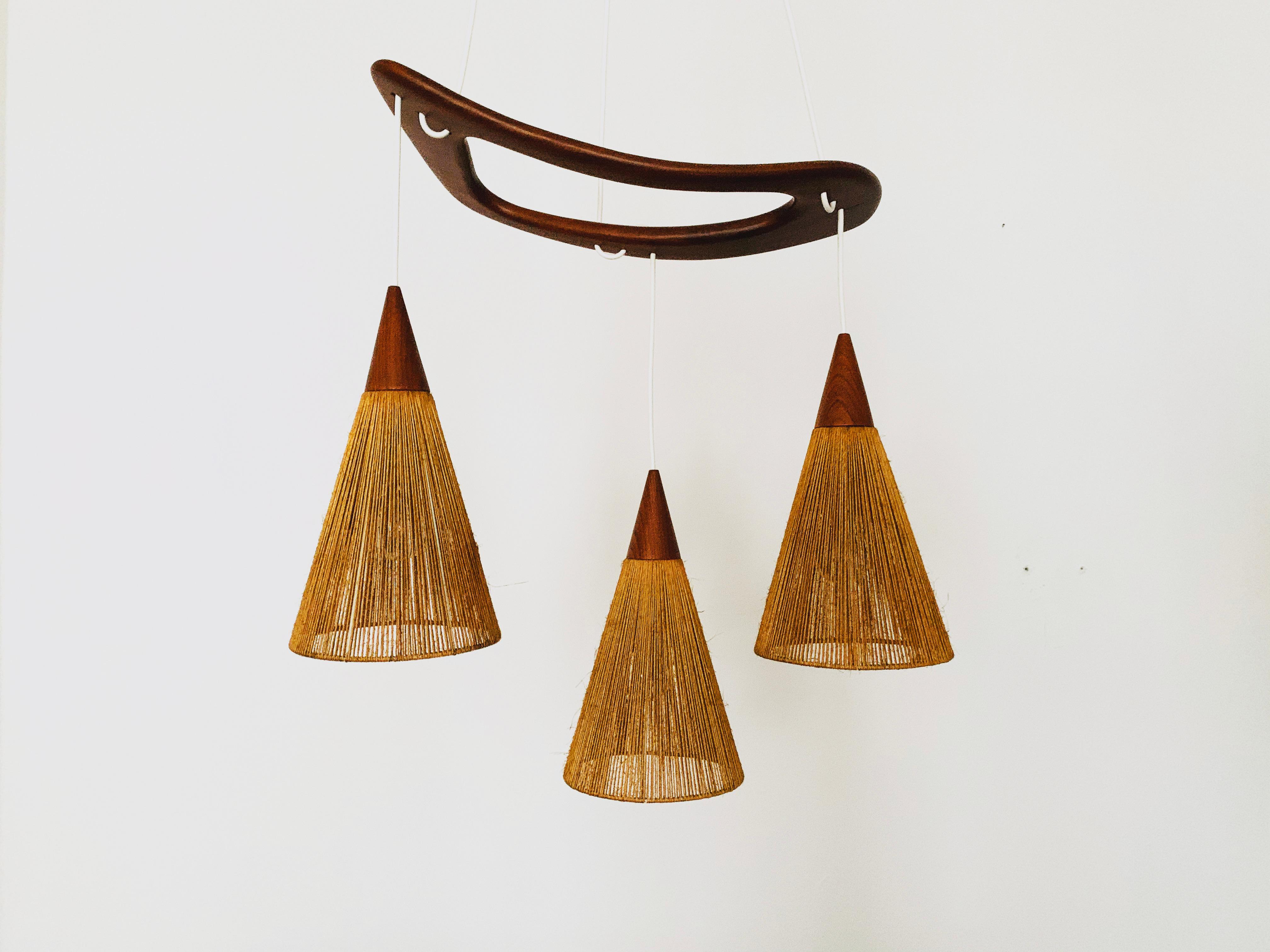 Beautiful lamp from the 1960s.
Great and unusual design with a fantastically comfortable look.
Very nice teak details and high-quality workmanship.
A spectacular play of light is created.

Design: Jean Rispal

Condition:

Very good vintage