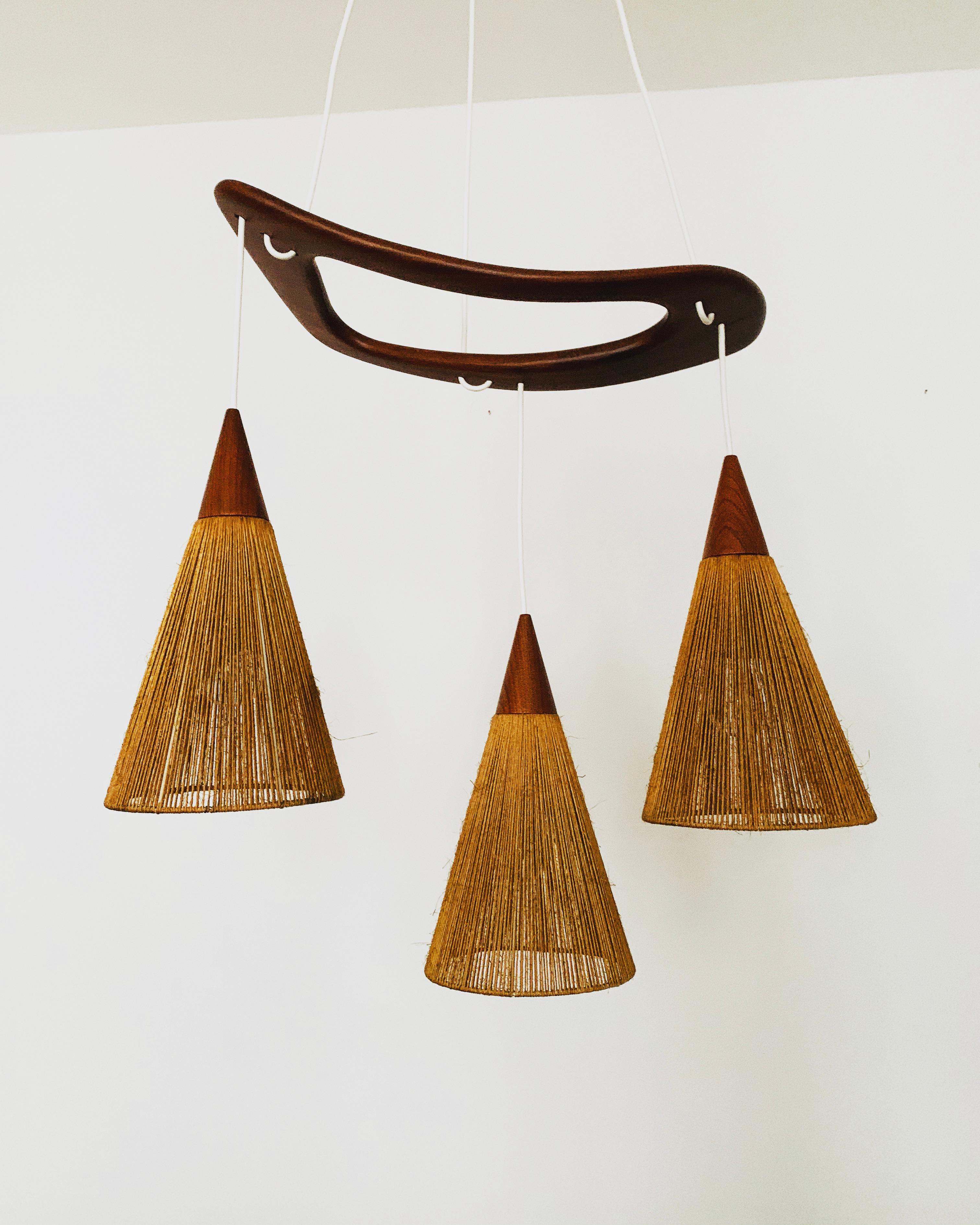 Beautiful lamp from the 1960s.
Great and unusual design with a fantastically comfortable look.
Very nice teak details and high-quality workmanship.
A spectacular play of light is created.

Design: Jean Rispal

Condition:

Very good vintage condition