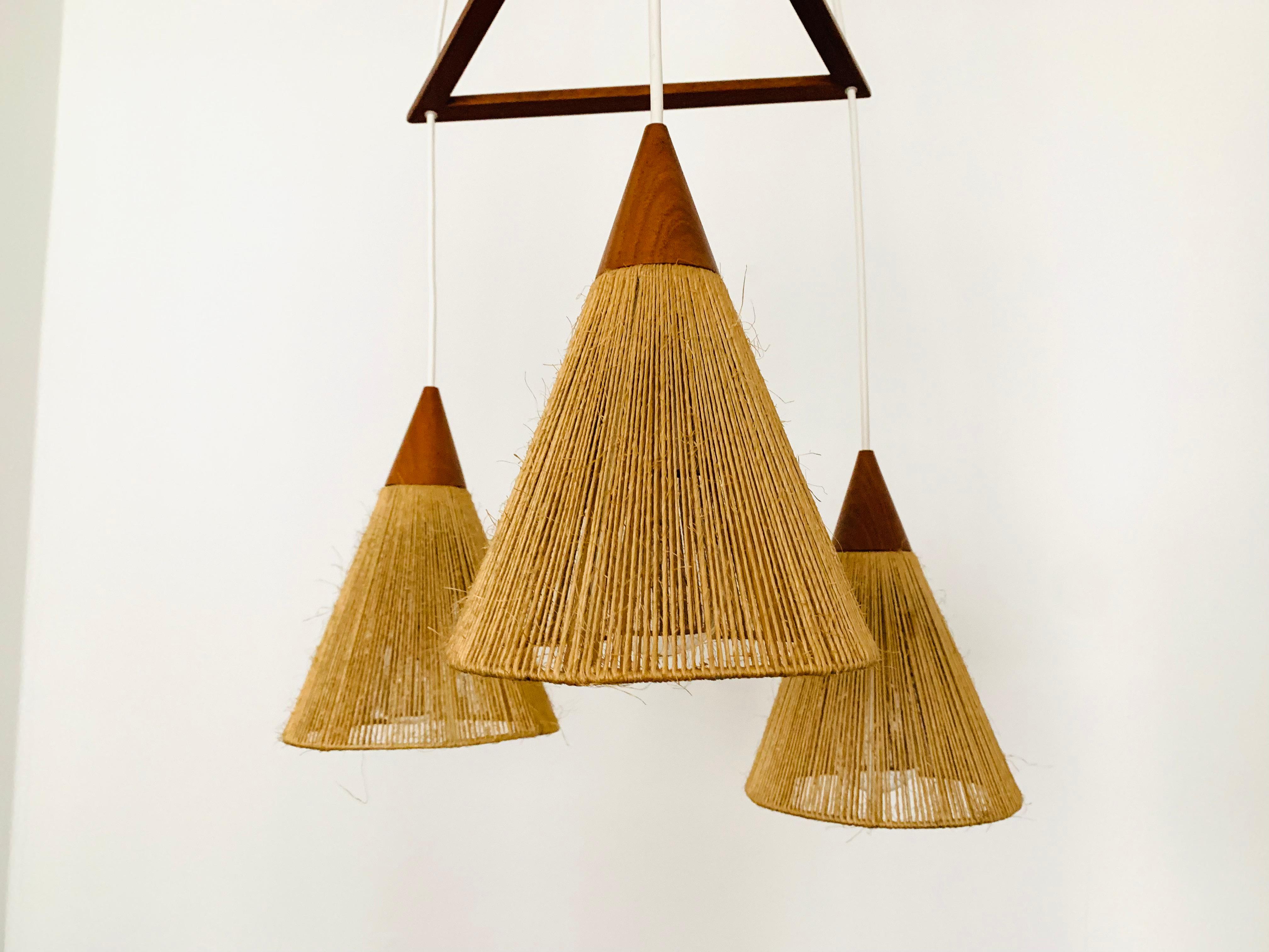 Teakwood and raffia bast cascading lamp by Temde In Good Condition For Sale In München, DE