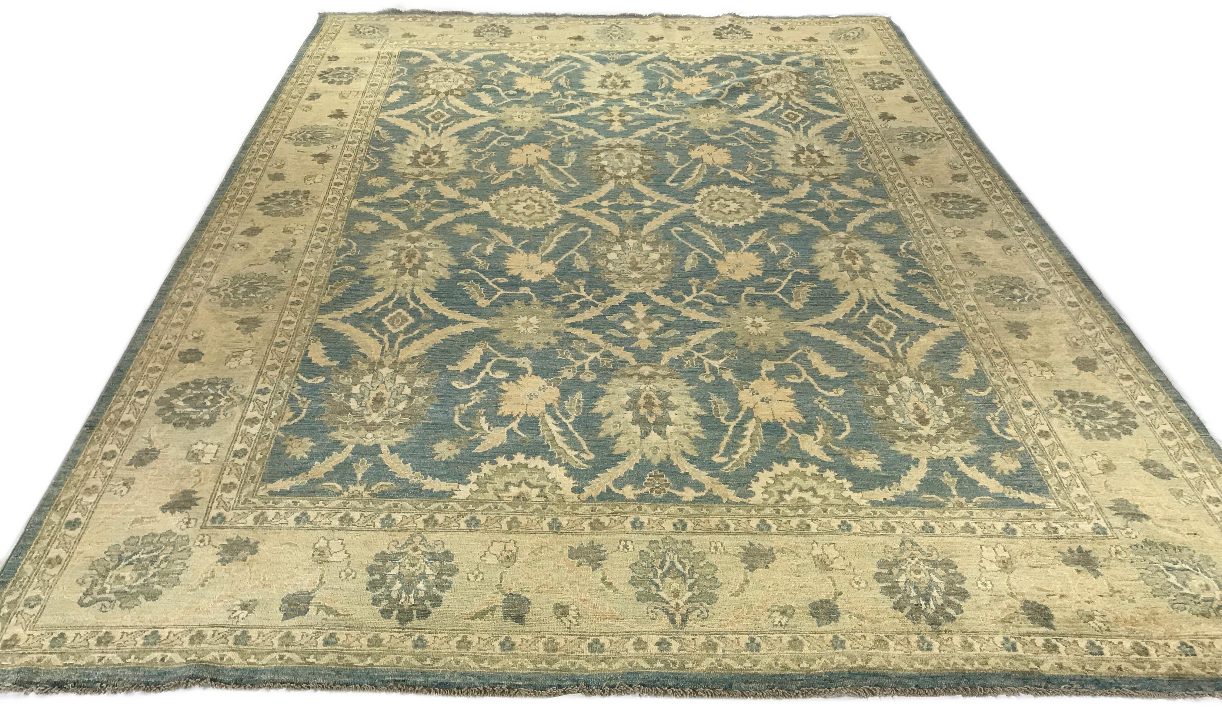 Teal and gold Traditional wool area rug. Measures: 7'10