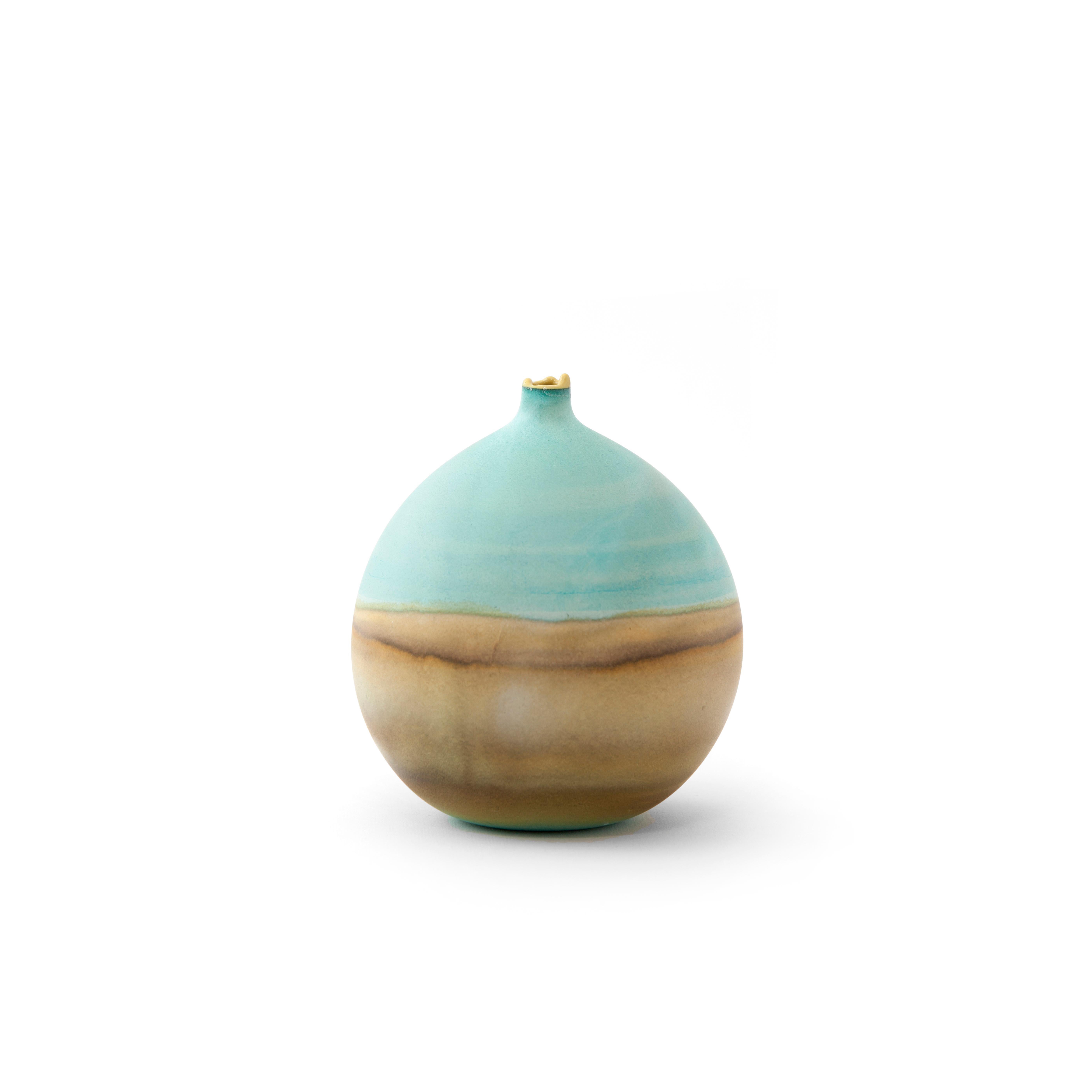 Teal and Ochre Pluto vase by Elyse Graham
Dimensions: W 13 x D 13 x H 14 cm
Materials: Plaster, Resin
MOLDED, DYED, AND FINISHED BY HAND IN LA. CUSTOMIZATION
AVAILABLE.
ALL PIECES ARE MADE TO ORDER

This collection of vessels is inspired by