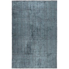 Tapis semi-pelucheux de luxe à motif contemporain bleu sarcelle et gris