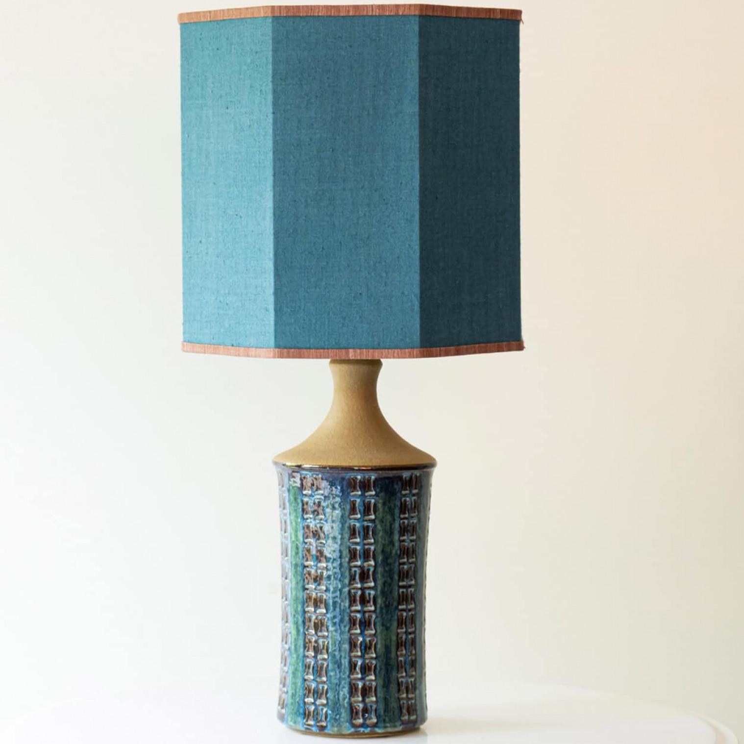 Heavy quality ceramic table lamp,  1970s.

This  lamp base brings refined elegance and rich visual appeal to any interior. With its beautiful shape, it offers a unique presence.

This teal blue colored ceramic base fits perfectly with the custom