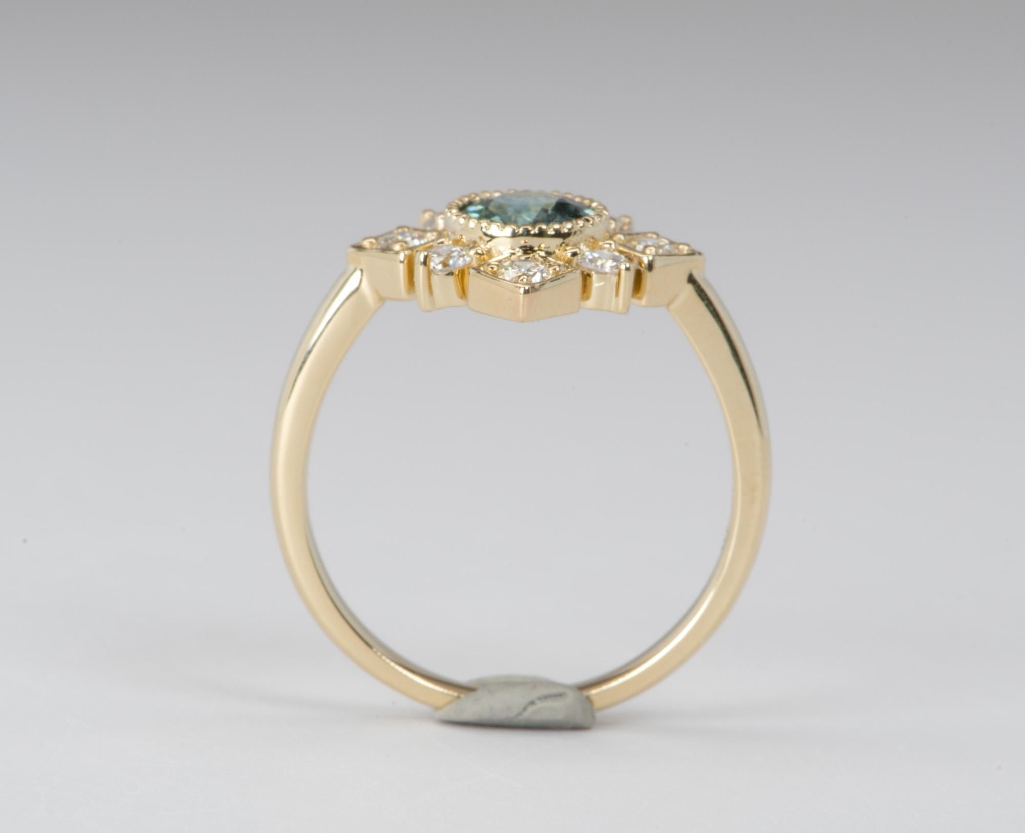 Teal Blue Montana Sapphire with Brilliant Diamond Halo 14K Gold Engagement Ring In New Condition For Sale In Osprey, FL