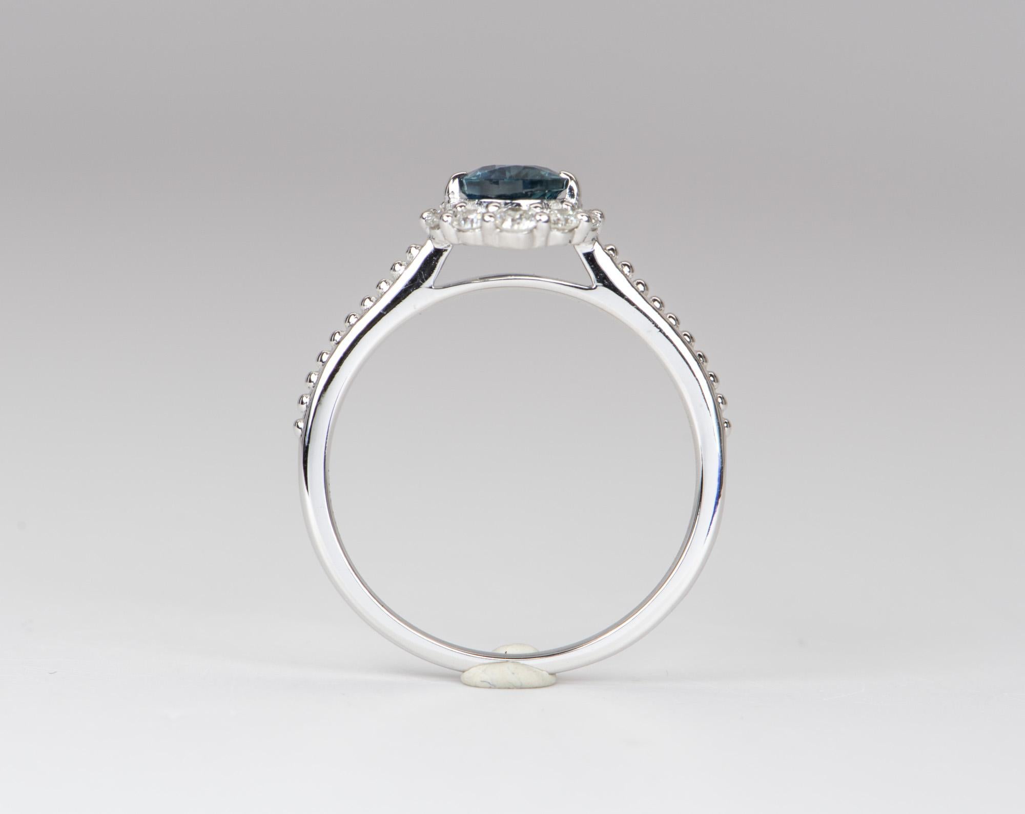 Teal Blue Montana Sapphire with Diamond Halo 14K White Gold Engagement Ring In New Condition In Osprey, FL