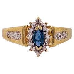 Teal Blue Sapphire Halo Birthstone Ring 0.25 Carats with Diamonds 10k Gold LV