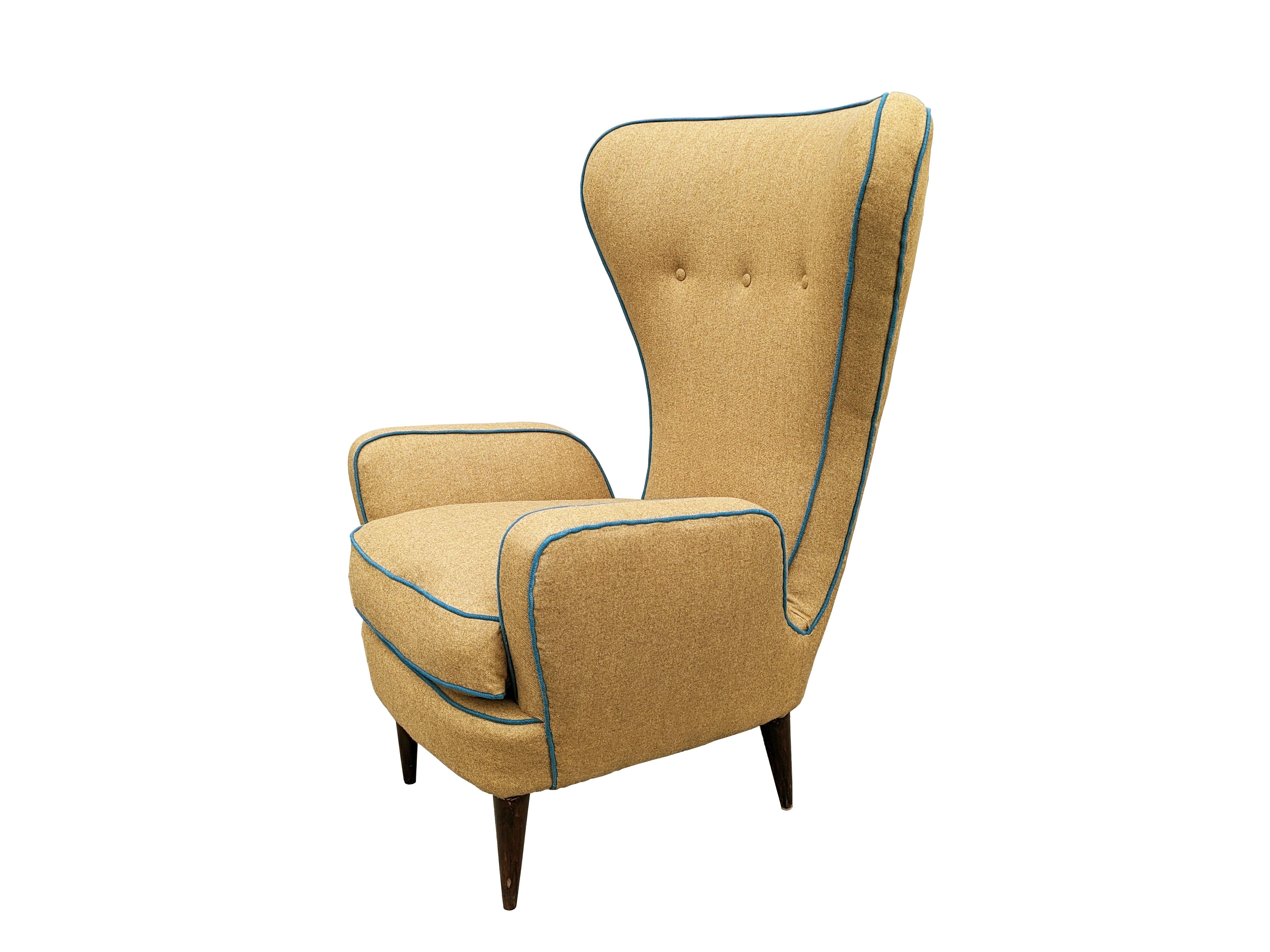 This sculptural highback armchair was designed by Emilio Sala and Giorgio Madini in the 1950s for the fratelli Galimberti furniture factory. The armchair has been completely reupholstered with an elegant camel and teal wool. The four feet have been