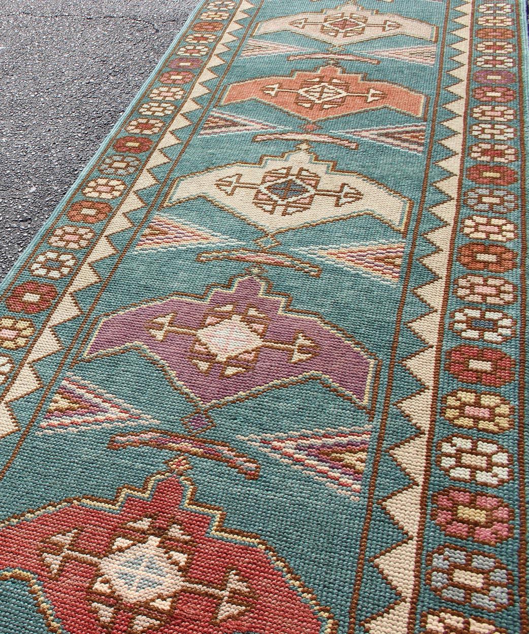 20th Century Teal Color Vintage Turkish Oushak Runner with Repeating Geometric Design For Sale