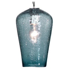 Lampe à suspension en forme de comète sarcelle de la collection Boa Lighting