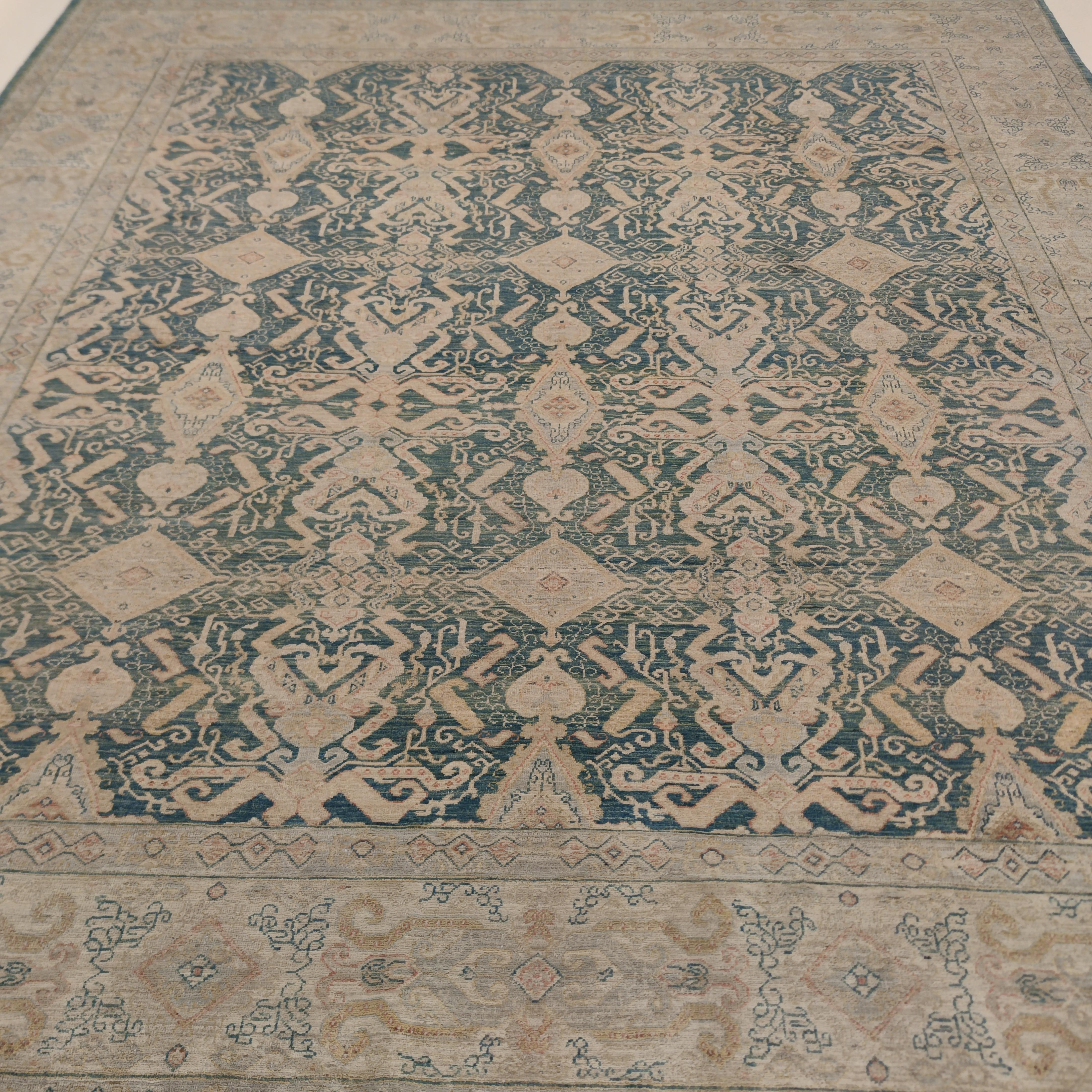Inspired by the magical palette of antique Tabriz carpets from the noble Hajijalili workshop, this finely knotted contemporary rug is one of the key examples of our contemporary collection of the Traditional type. Displaying an infinite repeat