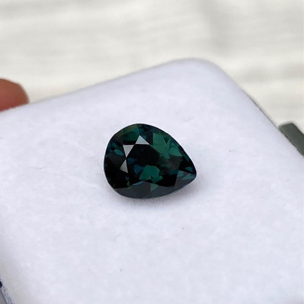 Design your own jewel creation using this breathtaking plump pear shaped teal green sapphire with no indication of thermal treatment and born in the gem fields of Madagascar. A divine, impressive hand-cut over 3 carat teal green sapphire rich in