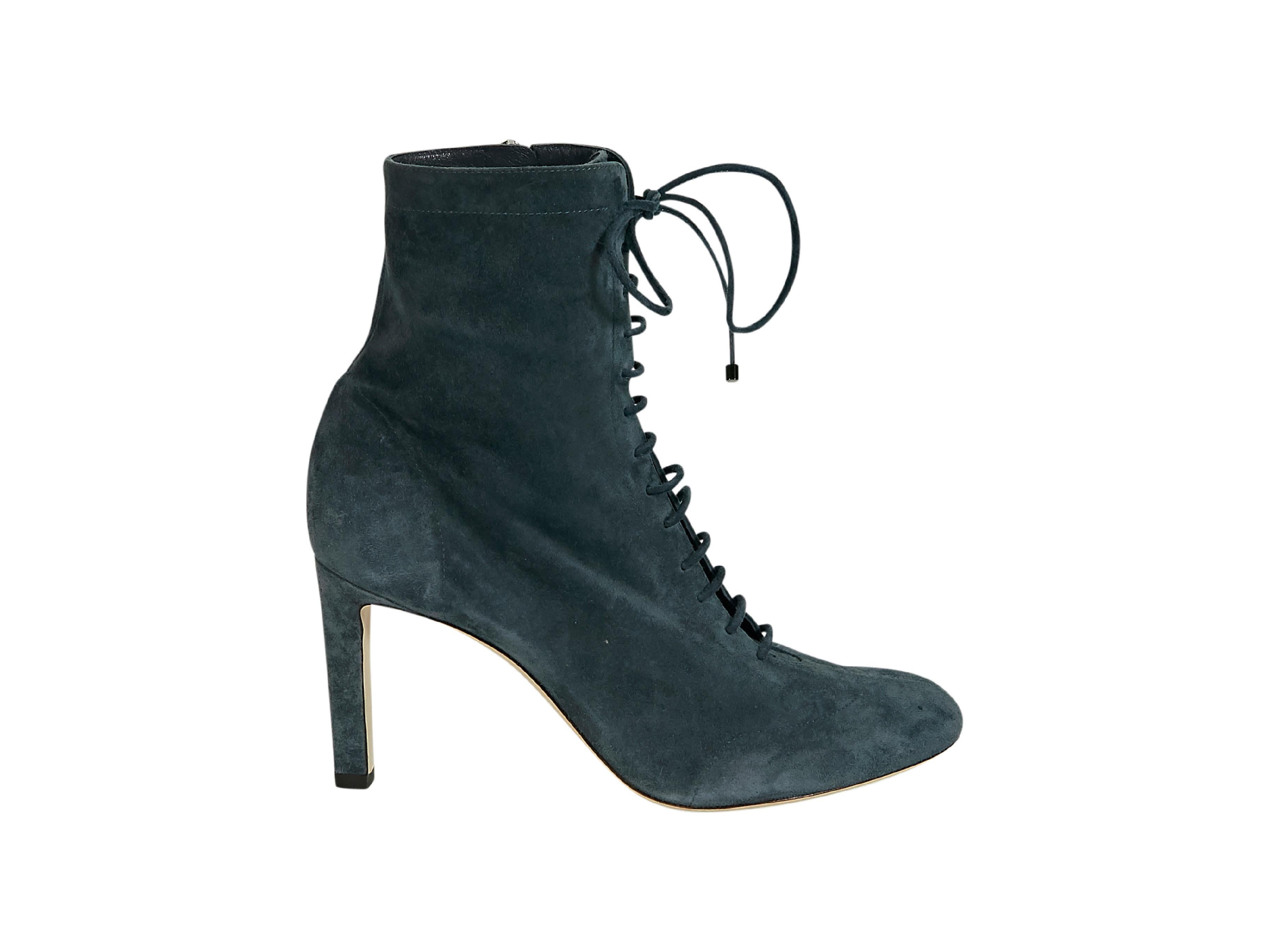 Product details:  Teal suede ankle boots by Jimmy Choo.  Lace-up panel.  Round toe.  Inner zip closure.  Silvertone hardware.  3.5