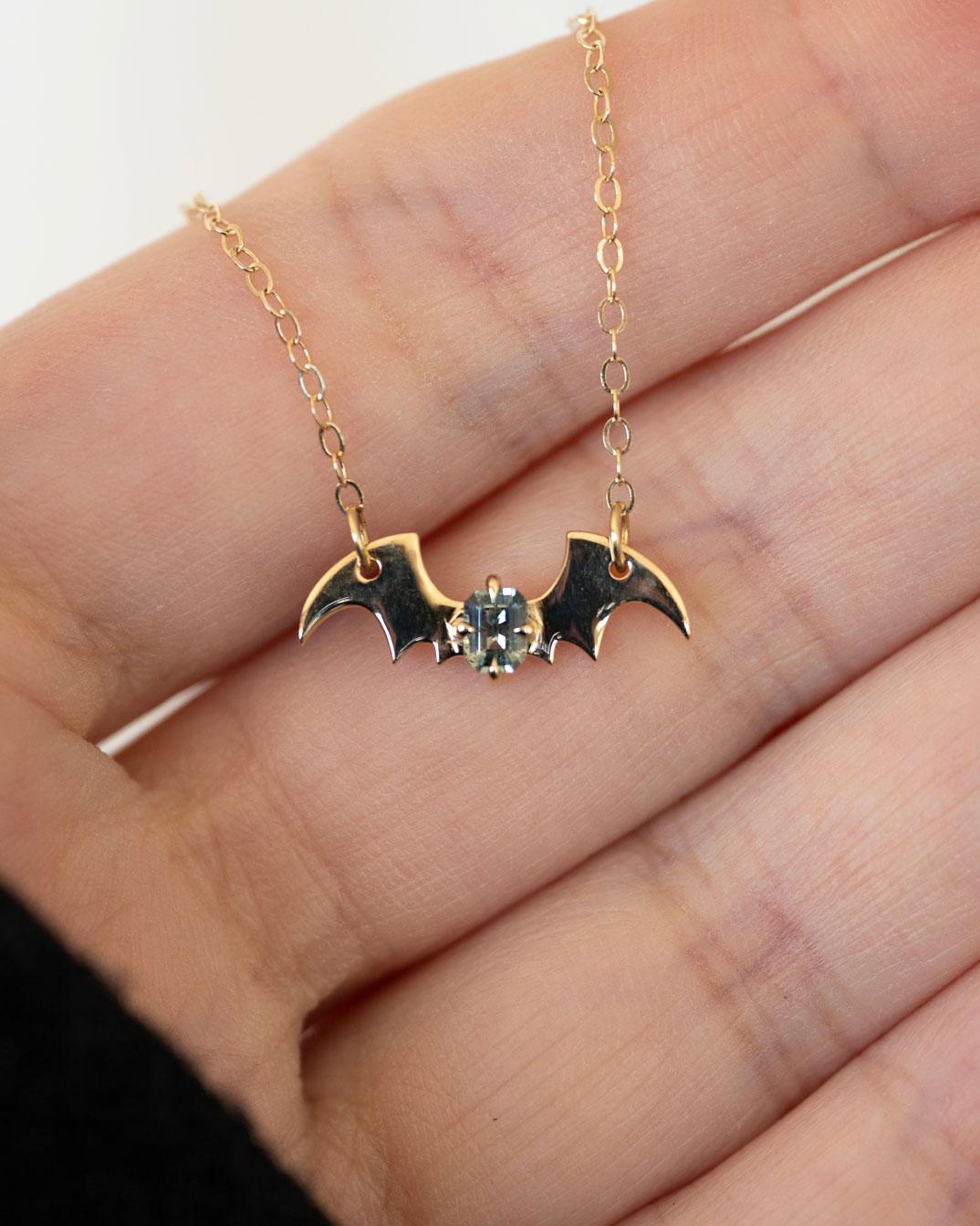 Artist Teal Montana Sapphire Emerald Cut Bat Morticia Necklace For Sale