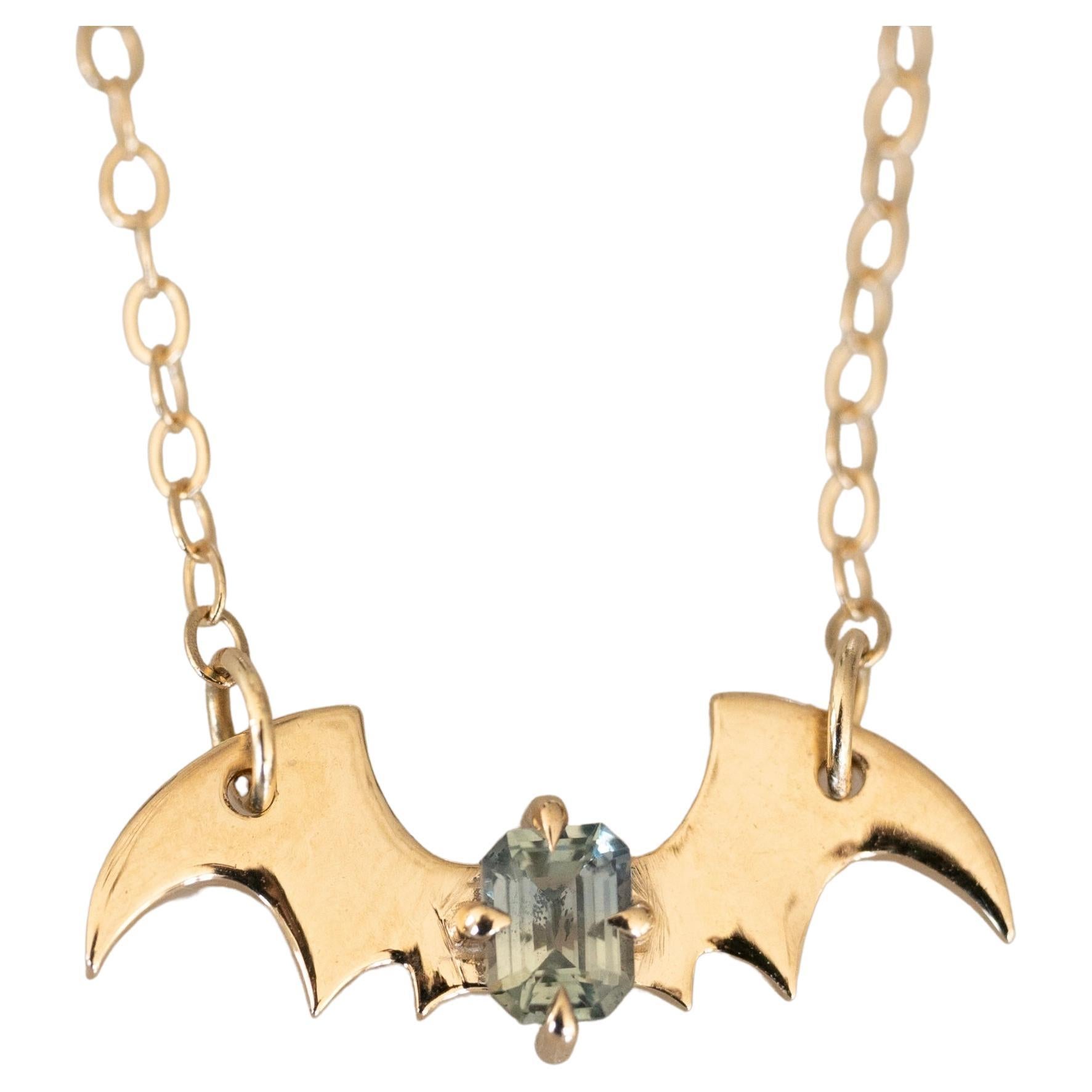 Teal Montana Sapphire Emerald Cut Bat Morticia Necklace For Sale