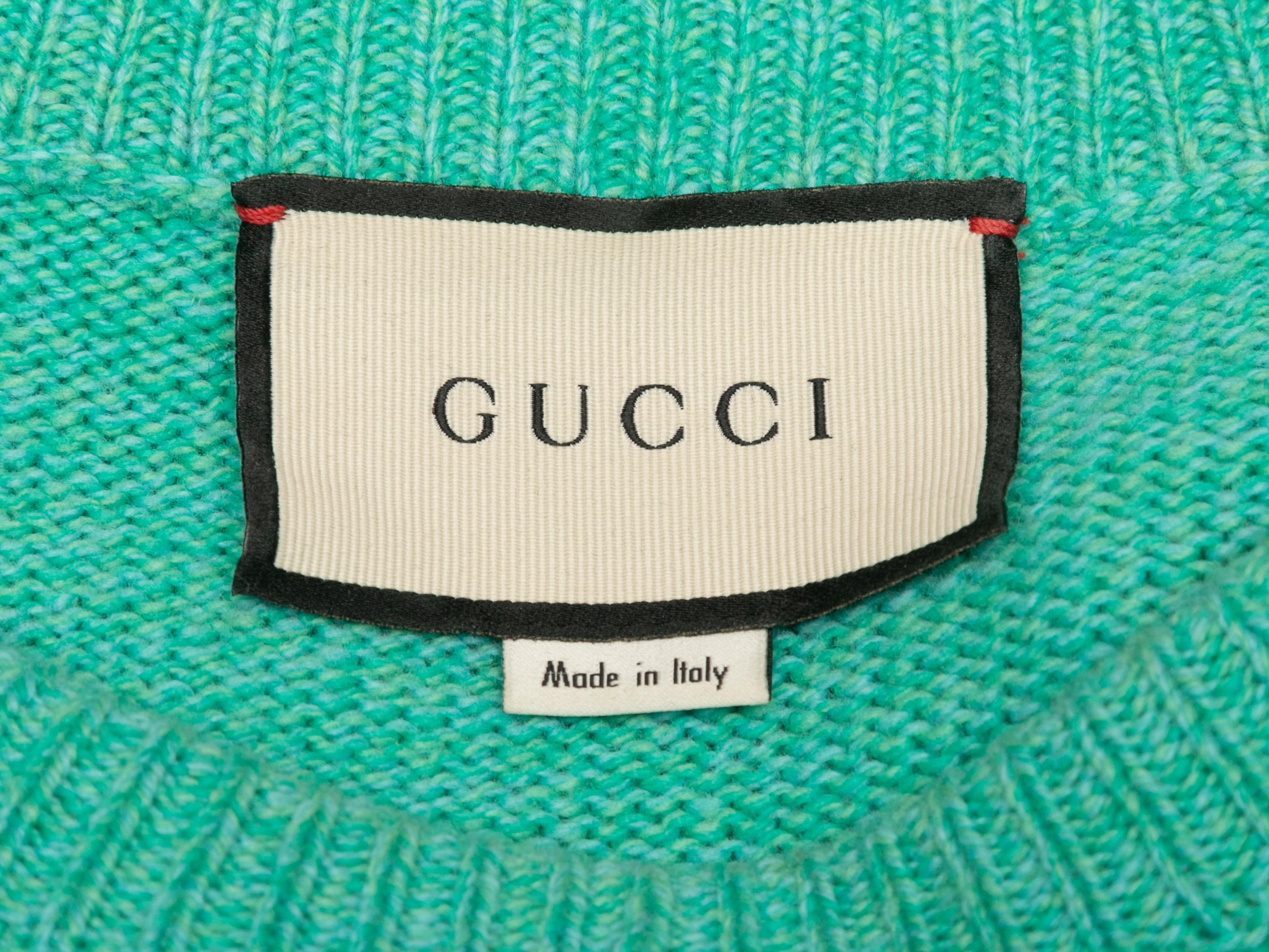 Teal and multicolor wool sweater by Gucci. Deer motif at front. Crew neck. 40