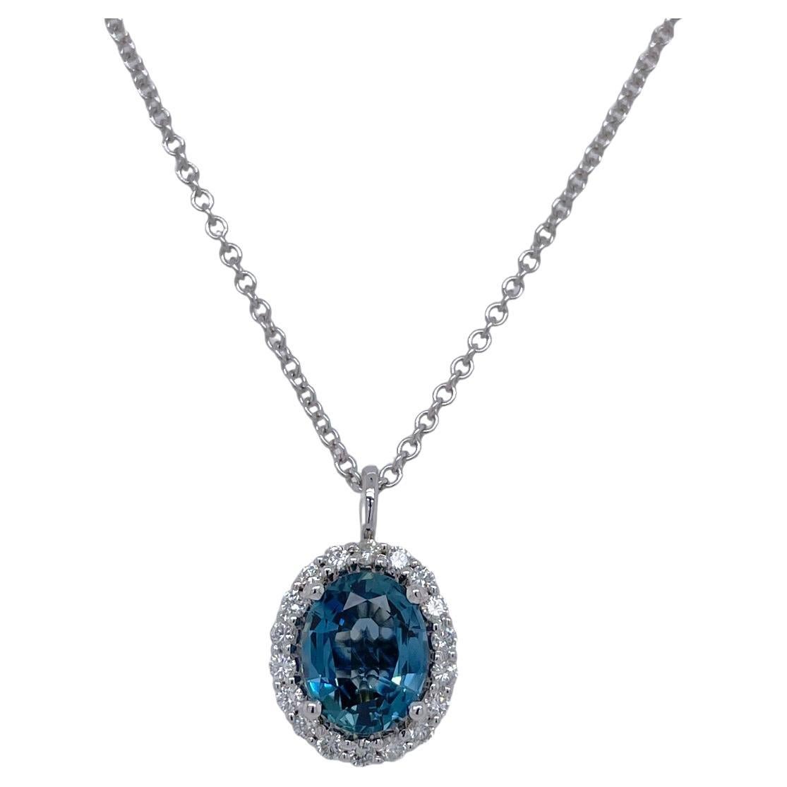 Teal Oval Sapphire & Diamond Halo Pendant 