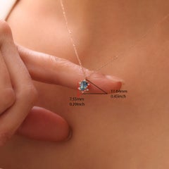 Teal Sapphire And Diamond Halo Pendant