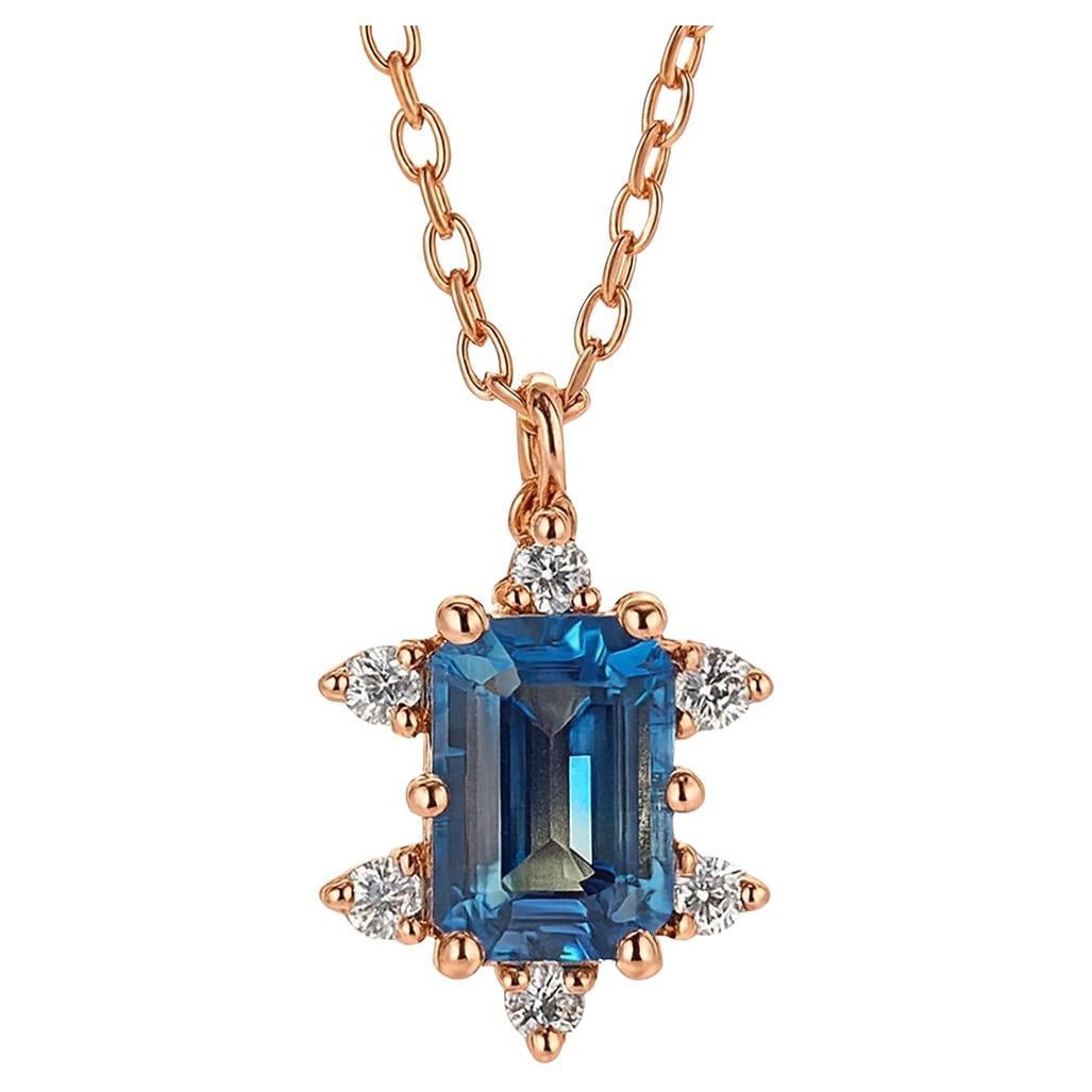 Teal Sapphire And Diamond Halo Pendant